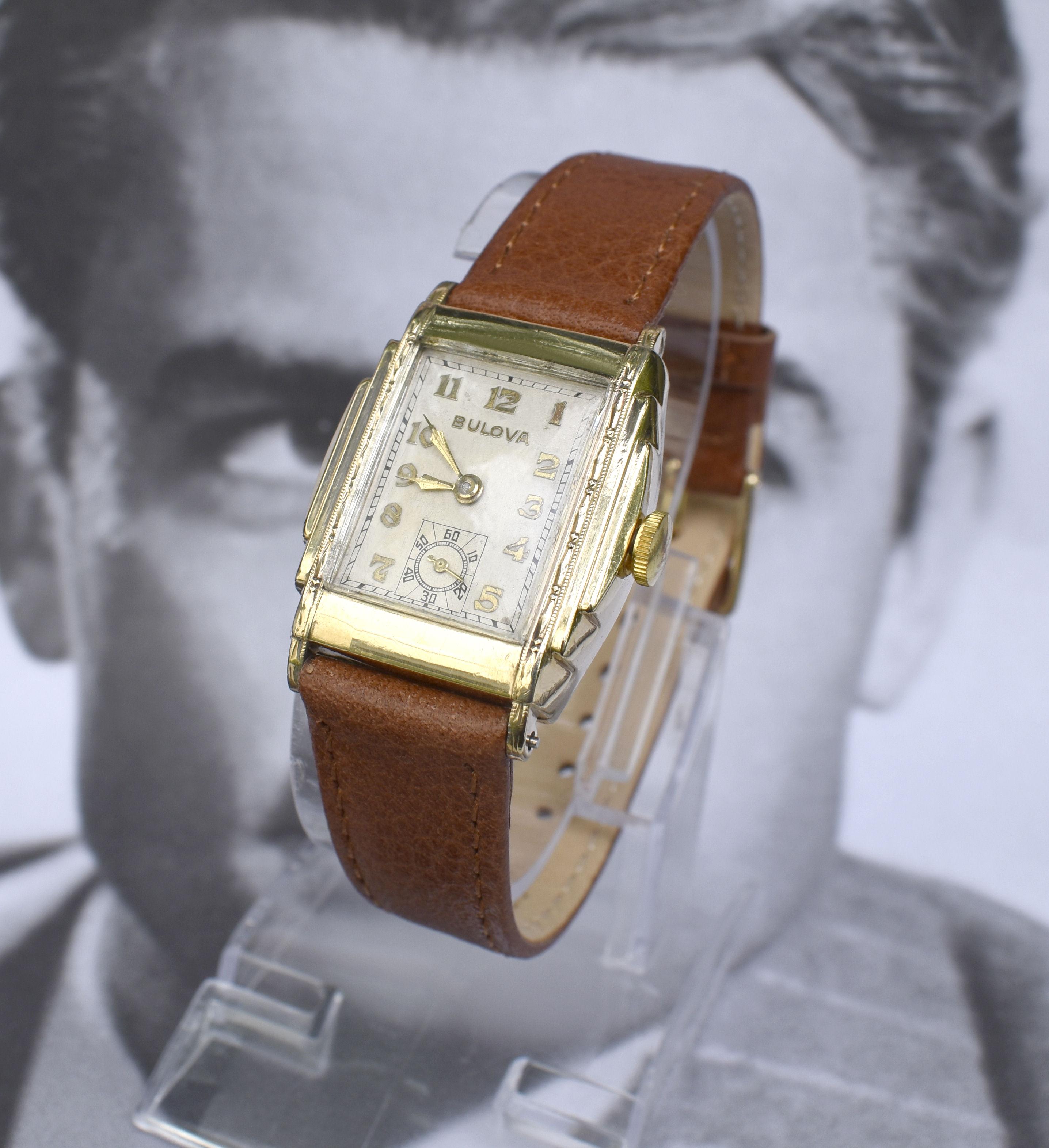 For your consideration is this wonderfully stylish Gents wrist watch dating to 1936. 10k rolled gold top and back with ornate filigree either side of the dial. Just serviced with new mainspring, crystal, winding crown and 16mm leather strap.