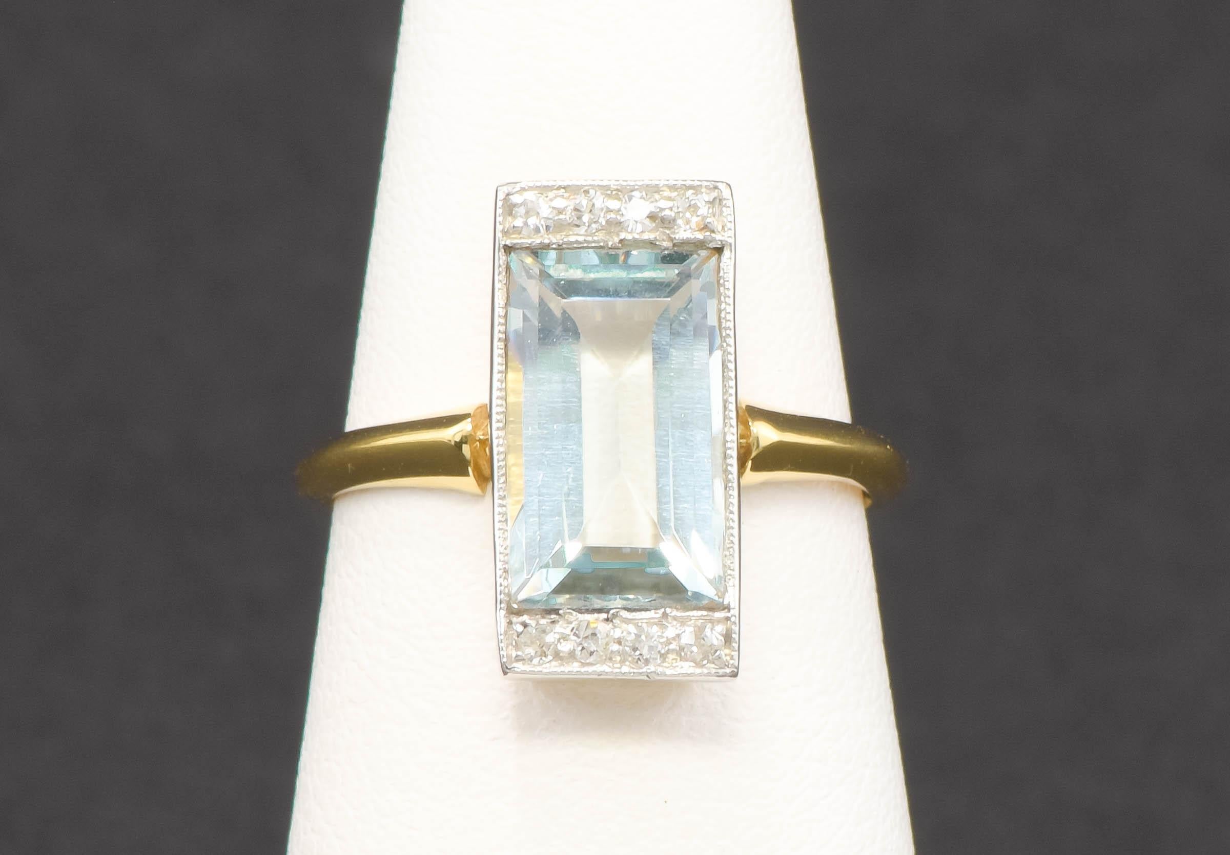 Great geometric style and elegance come together in this elegant late Edwardian to early Art Deco ring.  (please note that I struggled to get photos of the aquamarine in this ring - it is far prettier and more sparkly and icy looking than I could