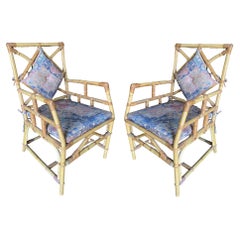 Paire de fauteuils Art Déco en rotin à dossier géométrique, par Paul Frankl