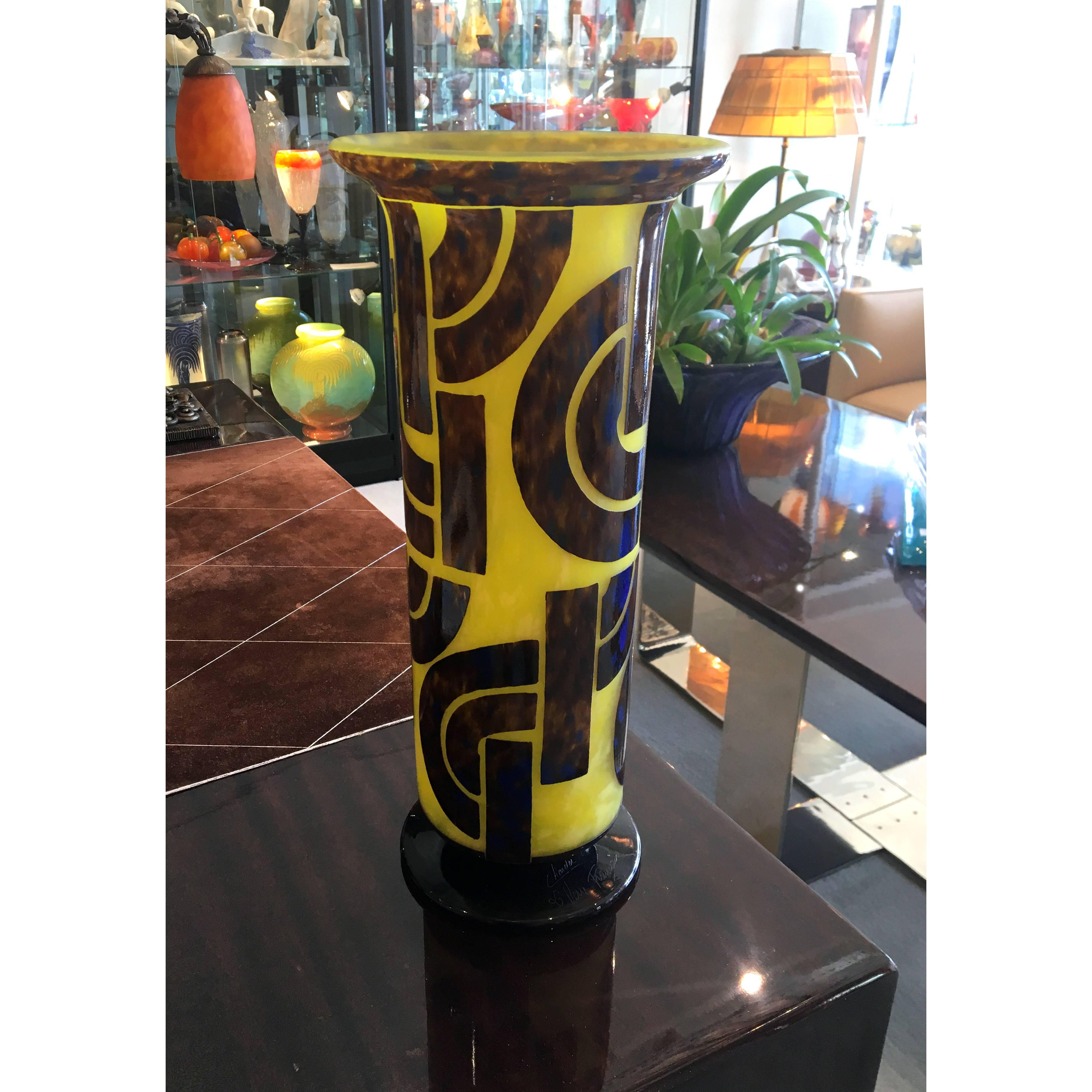 An Art Deco geometric glass vase in yellow and violet color with cobalt blue speckled by Le Verre Francais (Charles Schneider) with geometrical design.
Made in France
circa 1928
Signature: Le Verre Francais - Charder
This piece will be shipped