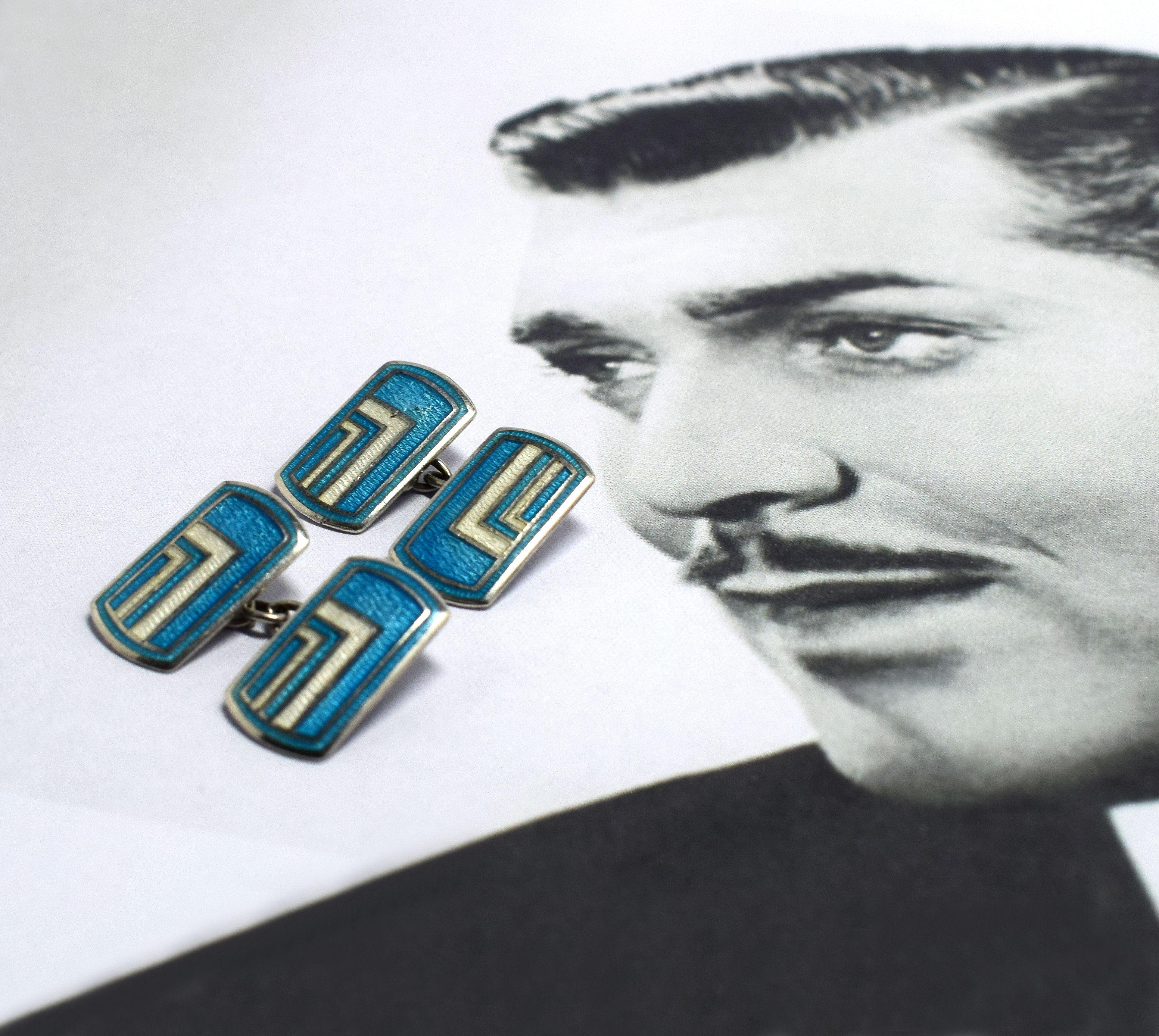 For your consideration are these rare and fabulously styled 1930s Art Deco geometric Guilloche enamel and sterling silver gents cufflinks. English made double cufflinks which feature the most dramatic geometric Art Deco design in blue, white and