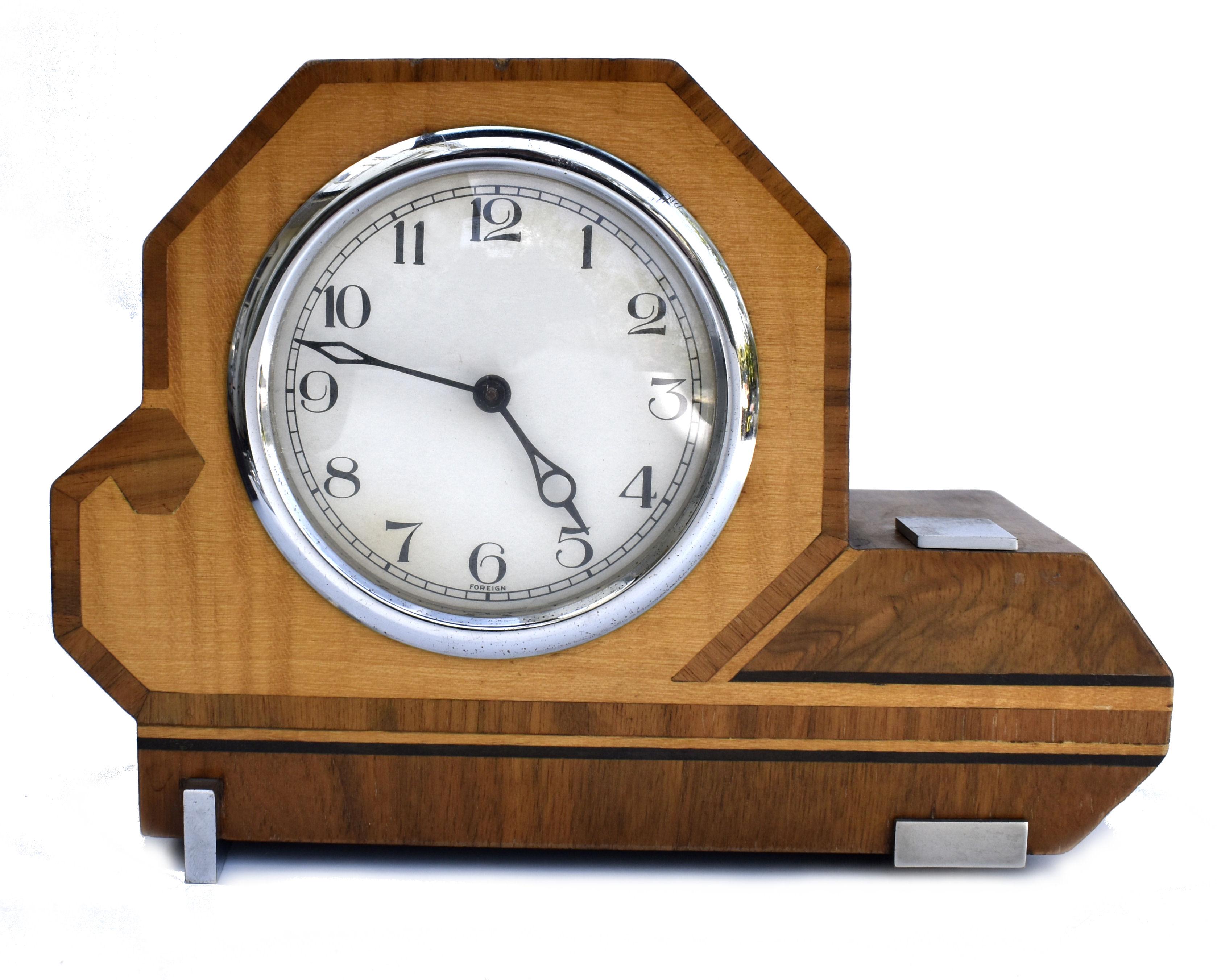 Art Deco Geometric Two Tone Wooden Mantle Clock. - Amazing Rare Shape.
The overall condition is very good. Fully serviced and working well. Wonderful shape, very indicative of this era. Chrome accents add to the appeal. Audible tick but not very