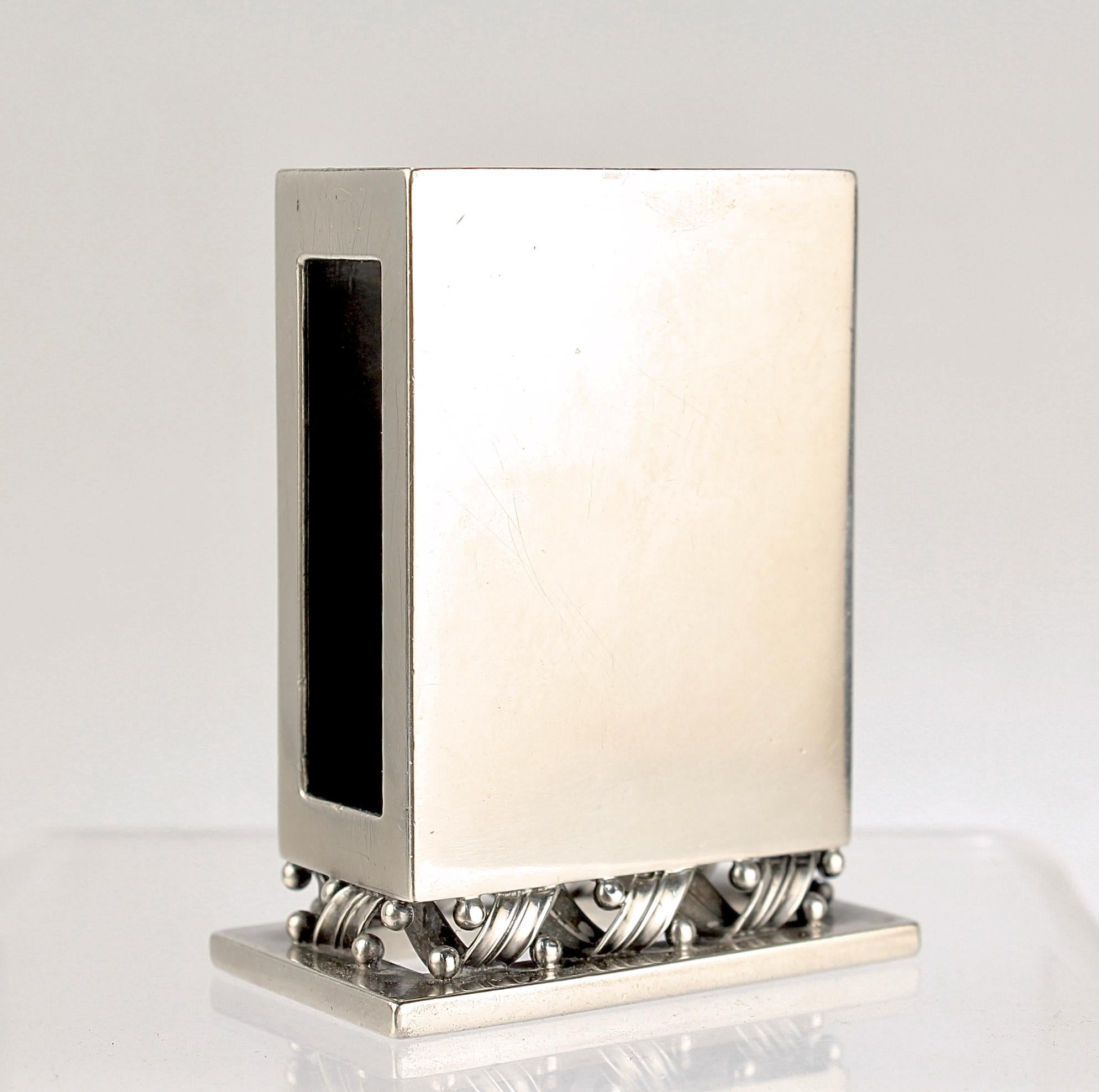 A fine sterling silver match holder.

Designed by Harald Nielsen for Georg Jensen.

Model no. 639.

Simply a wonderful piece of Georg Jensen silver!

Date:
Early 20th Century

Overall Condition:
It is in overall fair, as-pictured, used estate