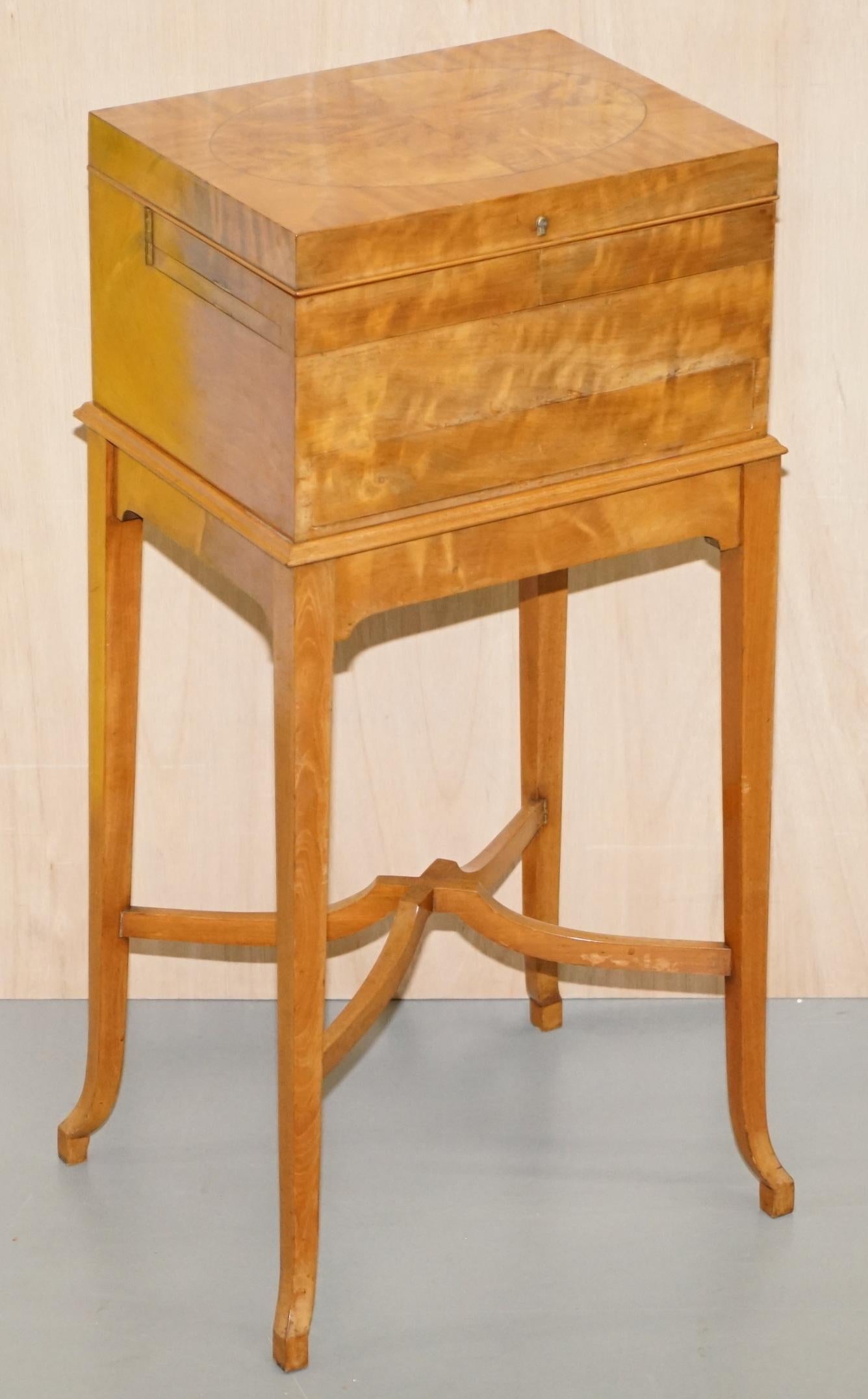 We are delighted to offer for sale this exceptionally fine Art Deco Satin wood George Betjemann & Son’s metamorphic dressing table with full a suite of sterling silver vanity items hallmarked for London 1920

This table is very rare and very