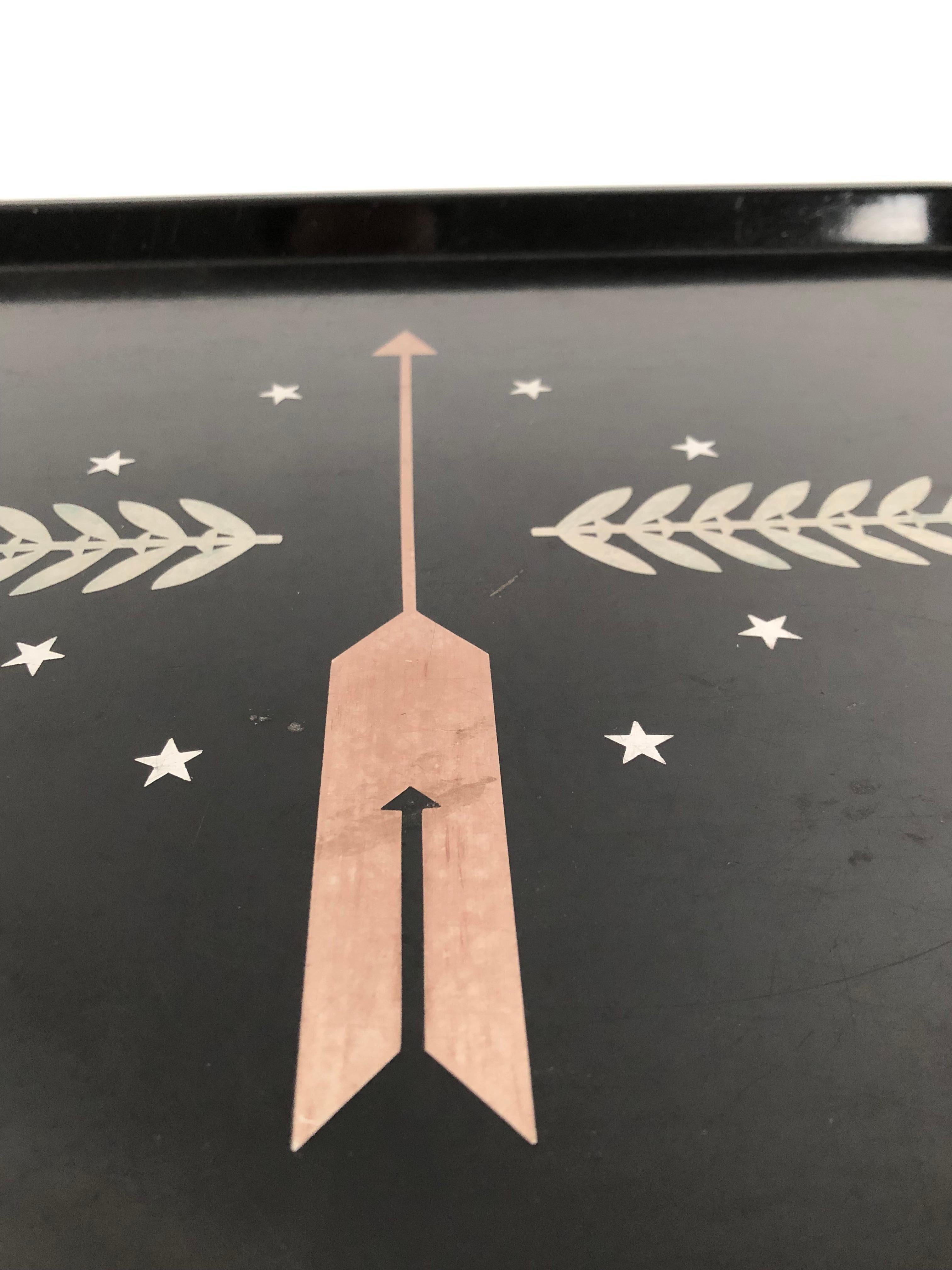 An Art Deco pewter and brass inlaid resin tray designed by George Switzer for Micarta, Westinghouse, American, circa 1930s. A wonderfully graphic modern tray incorporating patriotic American, neoclassical motifs, featuring a brass arrow pointing up