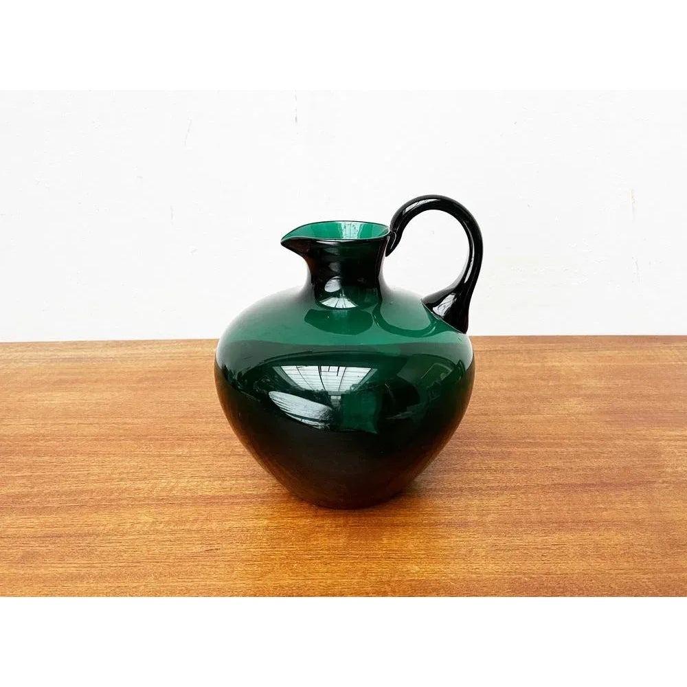 Art Deco German Green Glass Jug by Prof. Bruno Mauder for Zwiesel Theresienthal, 1930s, in Very Good conditions. Designed 1920 to 1949 official proof of authenticity such as vintage catalogs, designer records.

Additional information:
Materials: