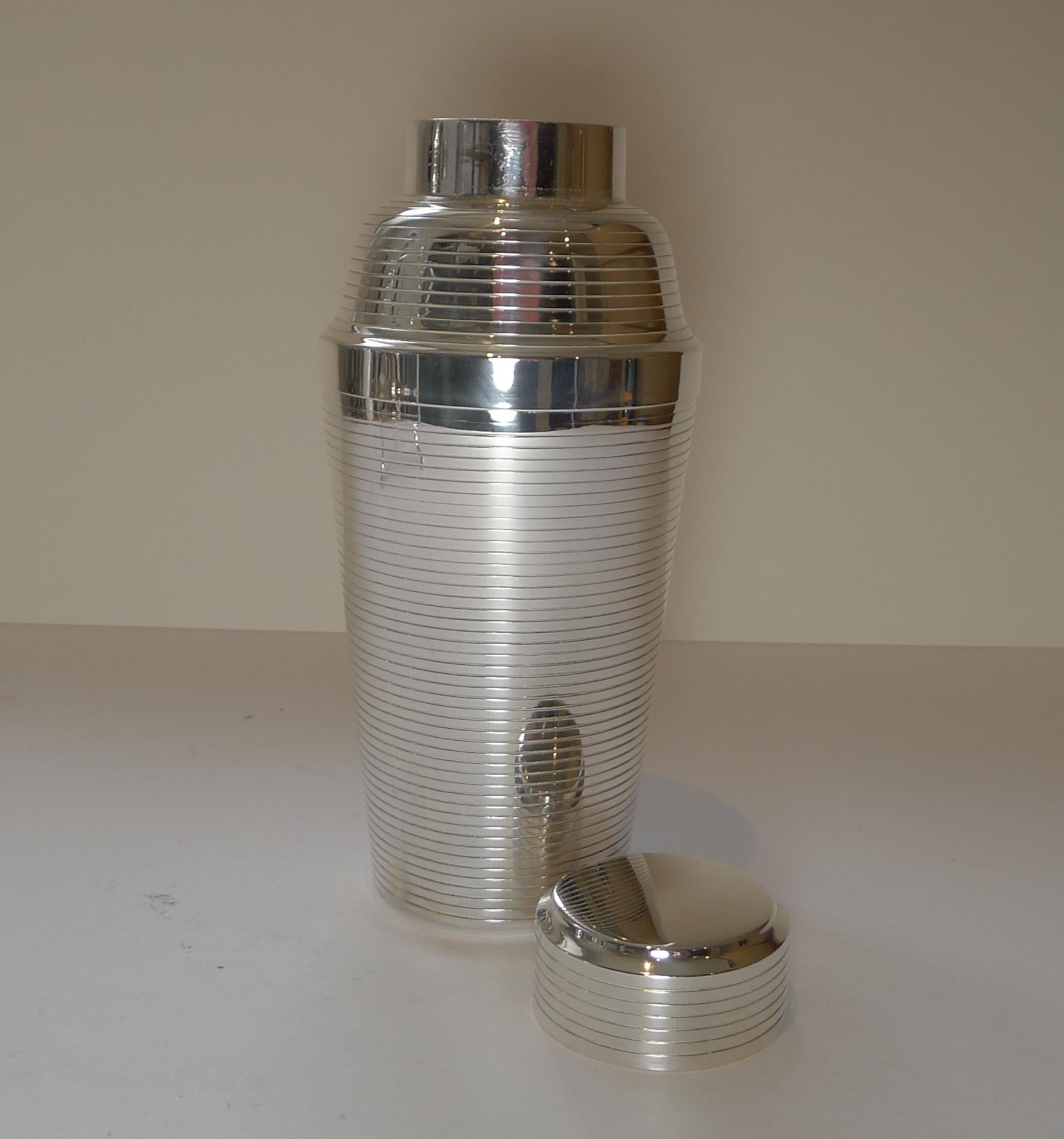 A handsome streamliner cocktail shaker by the well renowned Carl Deffner of Esslingen.

Just back from our silversmith's workshop where it has been professionally cleaned and polished, restoring it to it's former glory; minor interior wear