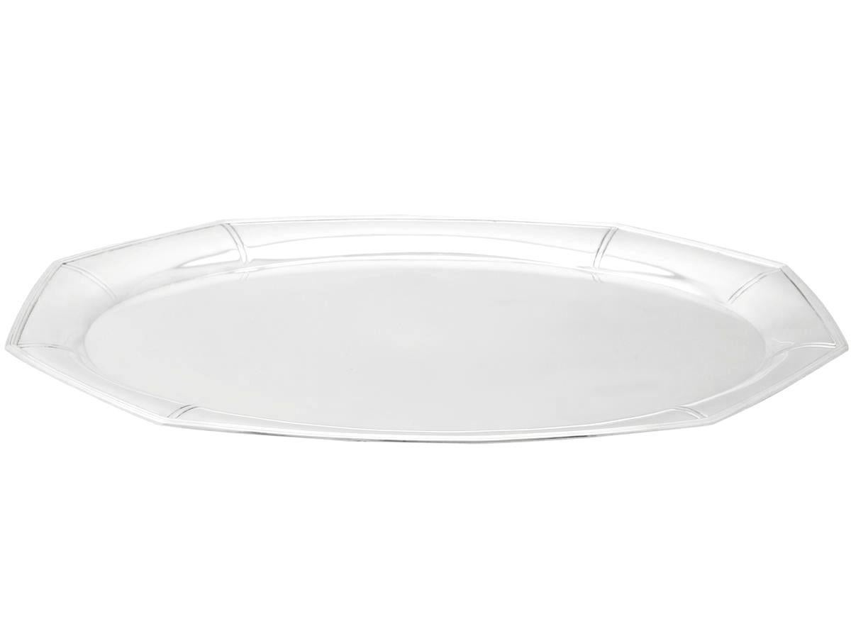 A fine and impressive vintage German silver salver in the Art Deco style, an addition to our continental silver collection.

This fine vintage German silver salver has an oval paneled form.

The surface of the silver salver is plain and