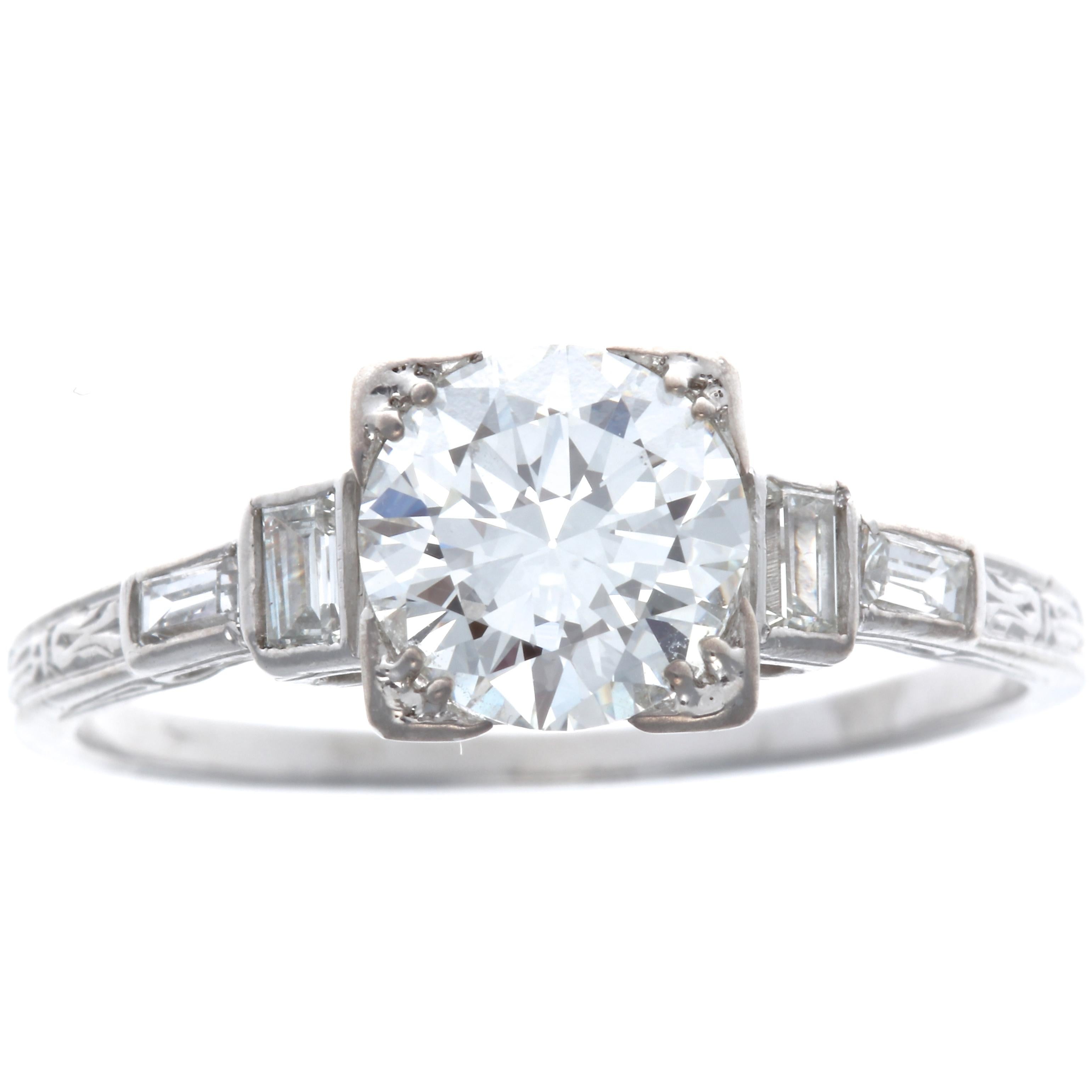 From the Art Deco era, resisting time maintaining sparkle and still beautiful, a ring for the ages. The center Old European Cut 1.19 carat diamond is GIA graded as G color, VS1 clarity.  Accented by 4 old baguette cut diamonds weighing approximately