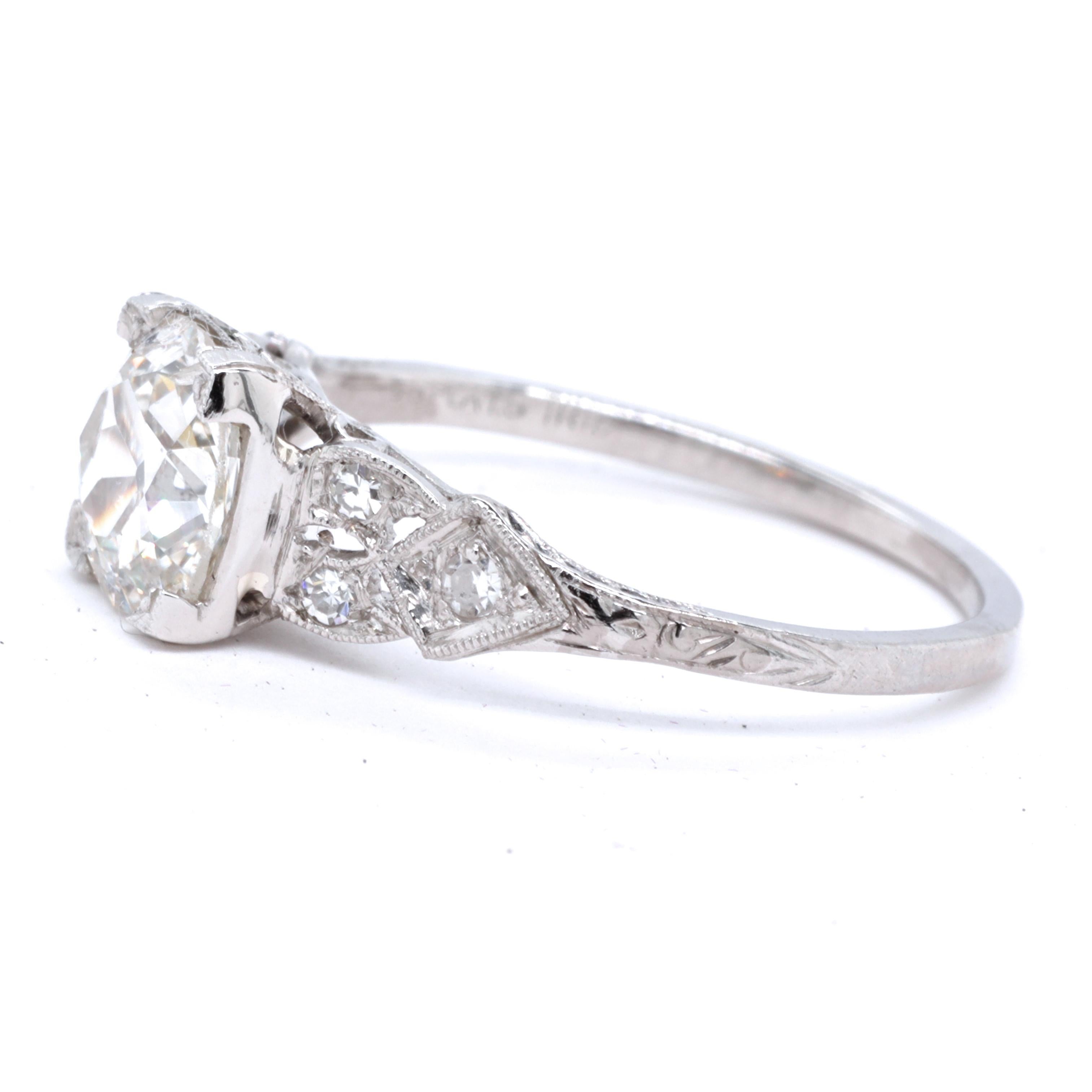 This could be your engagement ring. It has history, charm, elegance and longevity which bodes well for the future. The ring presents symmetry and delicacy, in the best Art Deco traditions. The center stone is GIA certified Old Mine Cut, 1.20 carat,