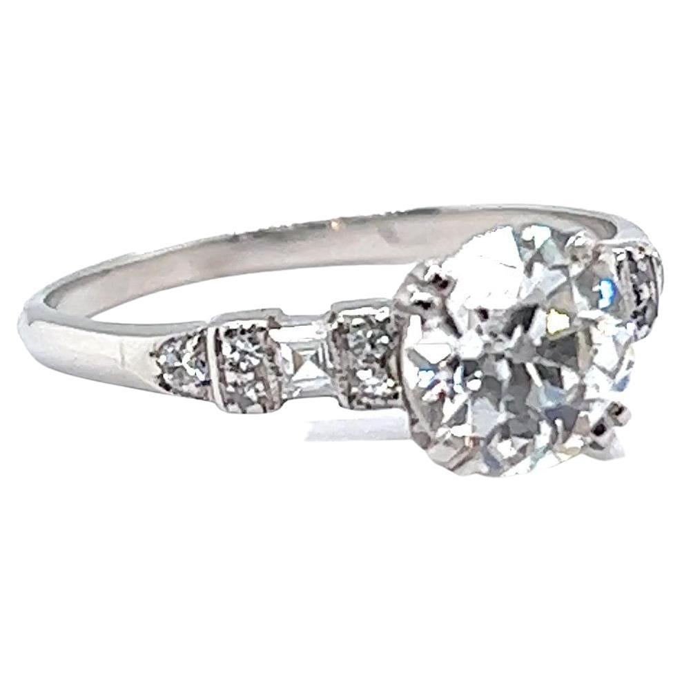 One Art Deco GIA 1.21 Carat Old European Cut Diamond Platinum Engagement Ring. Featuring one GIA certified old European cut diamond of 1.21 carats, accompanied with certificate #6227408470 stating the diamond is I color, SI1 clarity. Accented by two