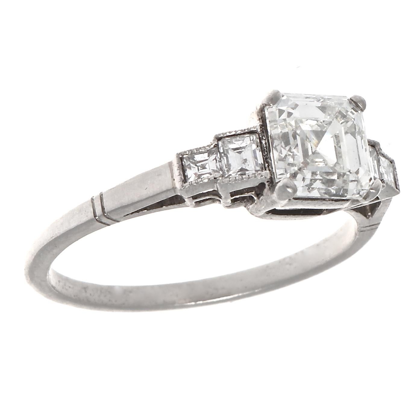 A direct reflection of the dramatic fashion and distinct style of the art deco time period. It was in 1909 that the asscher cut became more than a fantasy and became reality. Featuring a 1.30 carat asscher cut diamond that is GIA certified as H