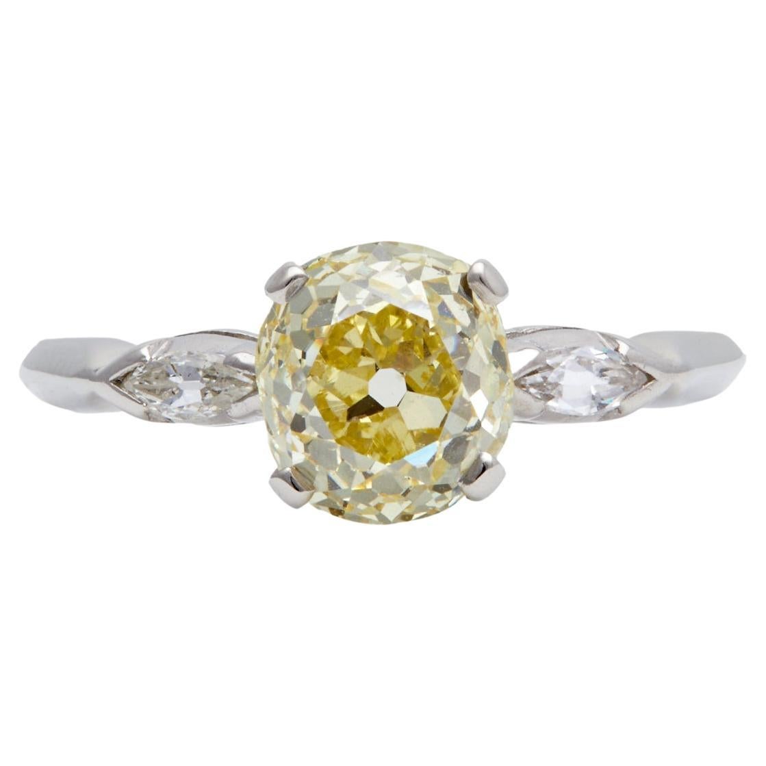 Art Deco GIA 1.50 Carats Fancy Light Yellow Old Mine Cut Diamond Platinum Ring For Sale