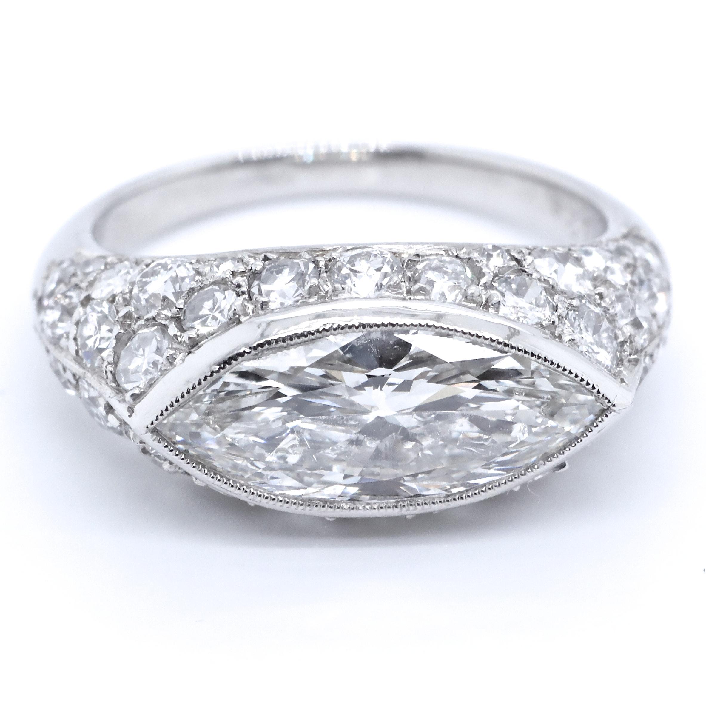 If you are looking for a one of a kind engagement ring, you just FOUND IT! Approximately 100 years old, with an east-west setting. There is no better combination for a unique antique engagement ring! Art Deco GIA Marquise Diamond Platinum Micro-Pave