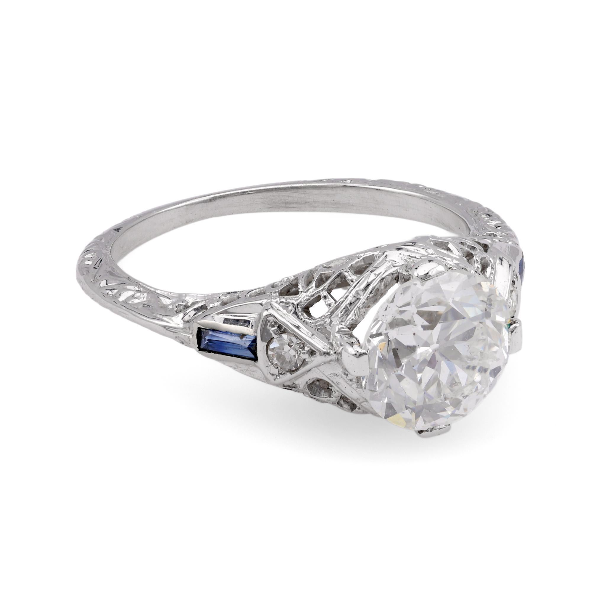 Certificate: GIA
Center Stone: Diamond
Cut: Old European 
Weight: 1.66 Carats
Color: G
Clarity: I2
Accent Stone: 2 Diamonds
Cut: Single
Weight: Approximately 0.06 Carat
Color: I-J
Clarity: SI
Accent Stone: 2 Blue Sapphire
Cut: Baguette
Weight: