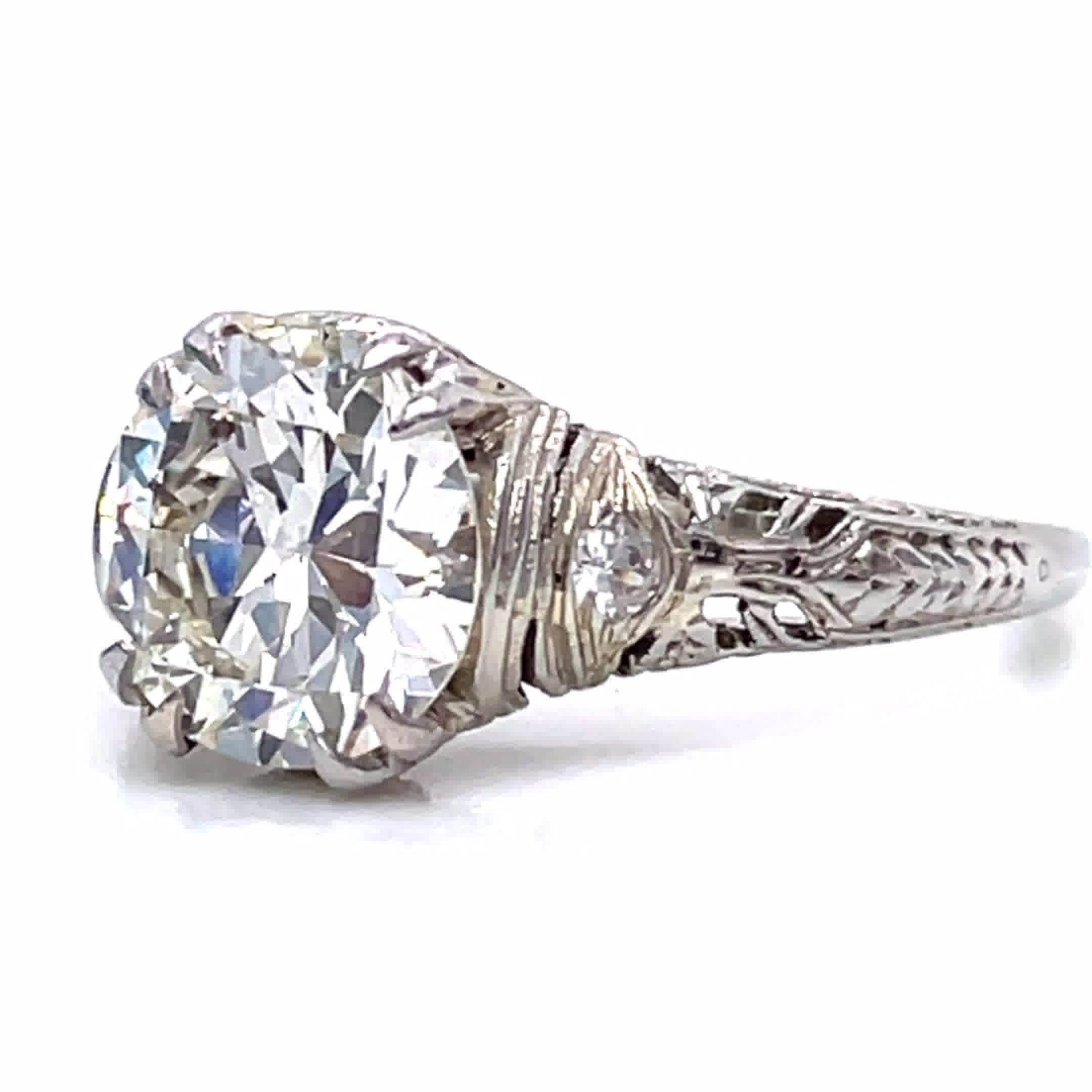 Are you on a hunt for the most precious and delicate Art Deco ring; consider this Art Deco GIA certified 2.02 carat Old European Cut Diamond Platinum Scottish Thistle Engagement Ring. Adorned with intricate, flowery detail, the ring is feminine and