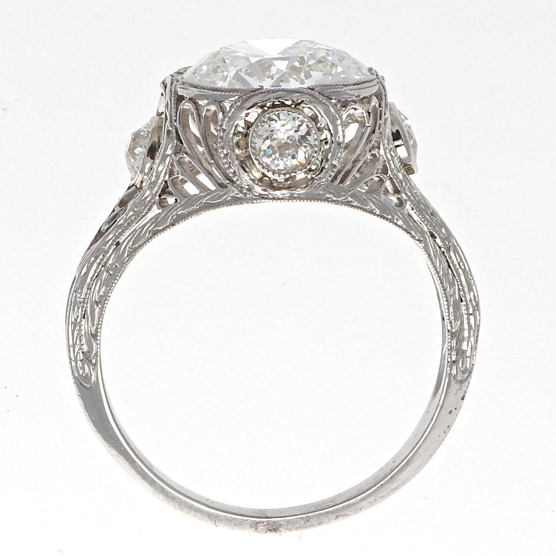 From the art deco period that has yet to be surpassed for elegance and the perfect ring to compliment the woman that will always be fashionable. Featuring a 2.68 carat old European cut diamond that is GIA certified as E color, SI1 clarity that is