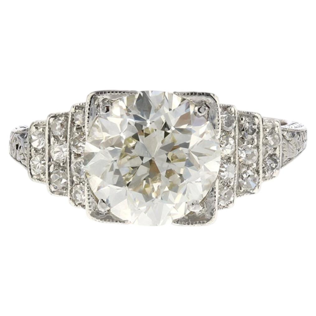 Bague de fiançailles Art déco avec un diamant rond taille brilliante de 3,03 carats (GIA) et un ensemble de diamants en vente