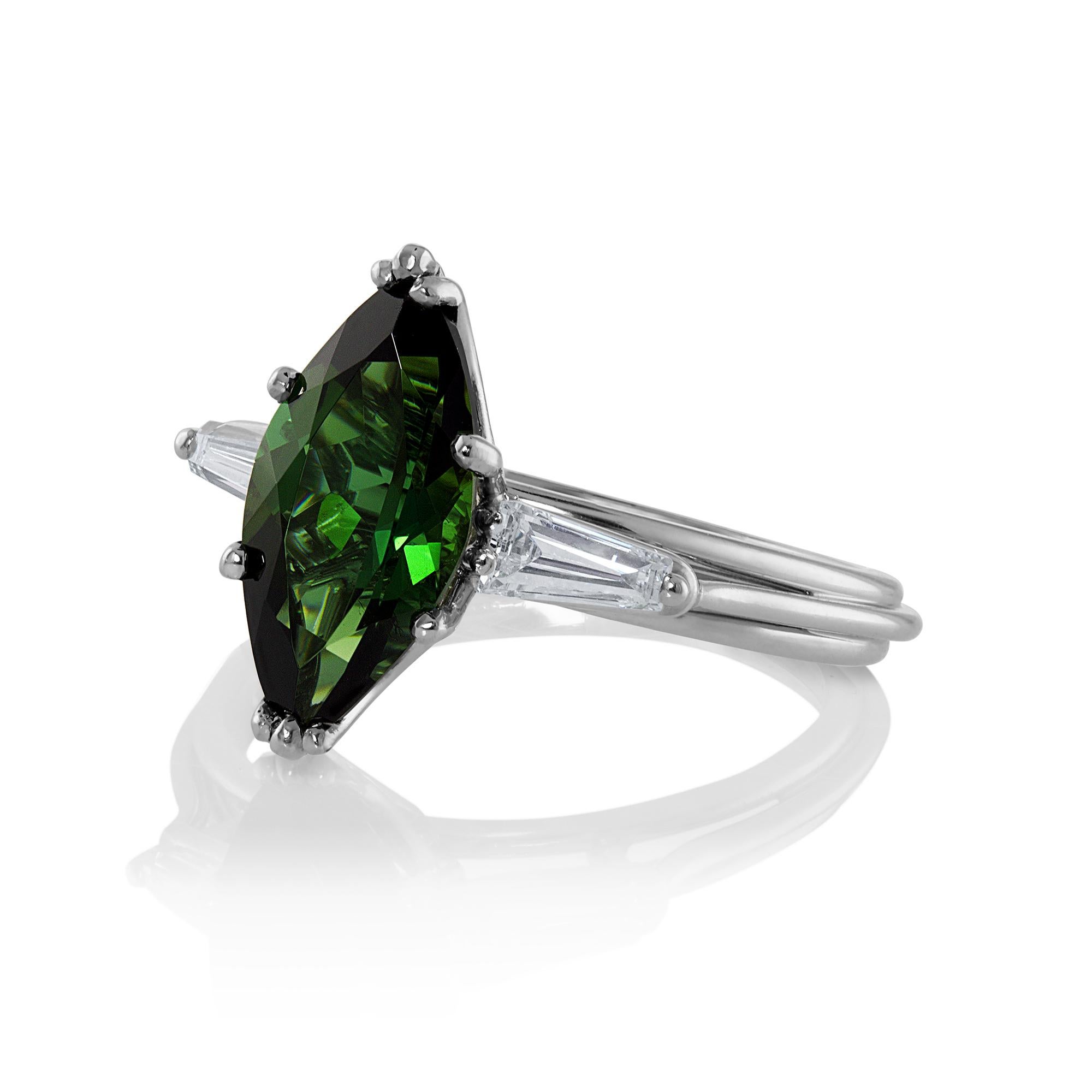 Late Art Deco, Iconic style of the 3 Stone Green Tourmaline and Diamond engagement ring, Circa 1930s-1940s. This Amazing Ring can be worn as an Engagement ring, Wedding, Anniversary or as a right hand ring! A knock-out!
A Breathtaking Vintage