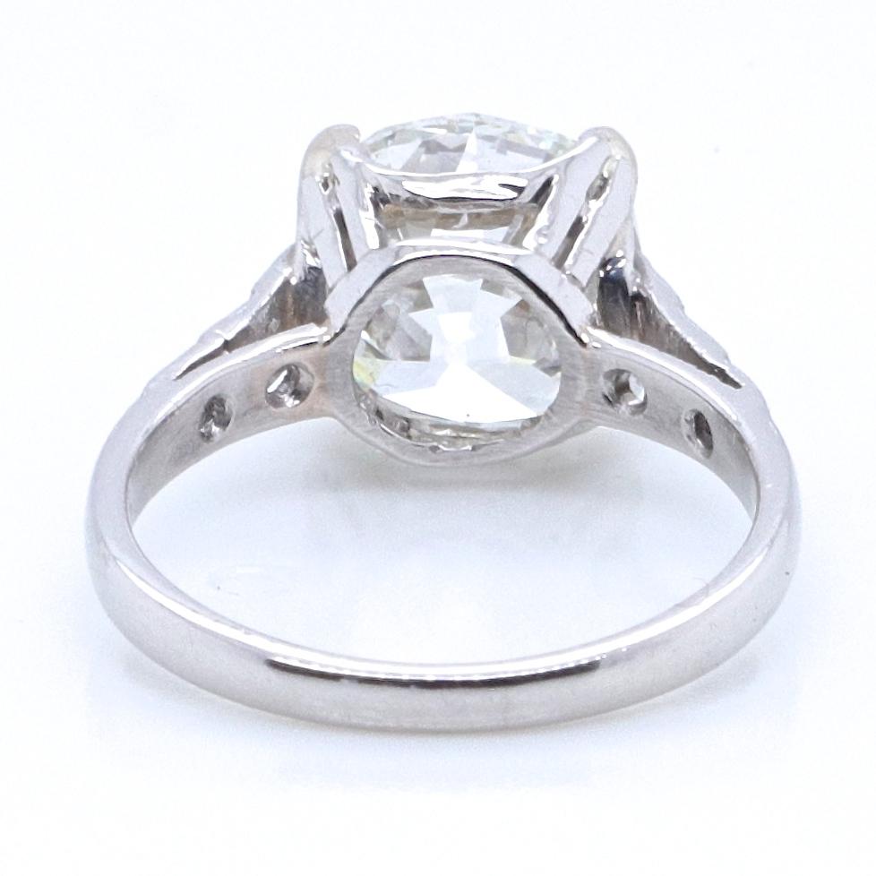 Women's Art Deco GIA 4.02 Carat Cushion Cut Diamond Platinum Ring