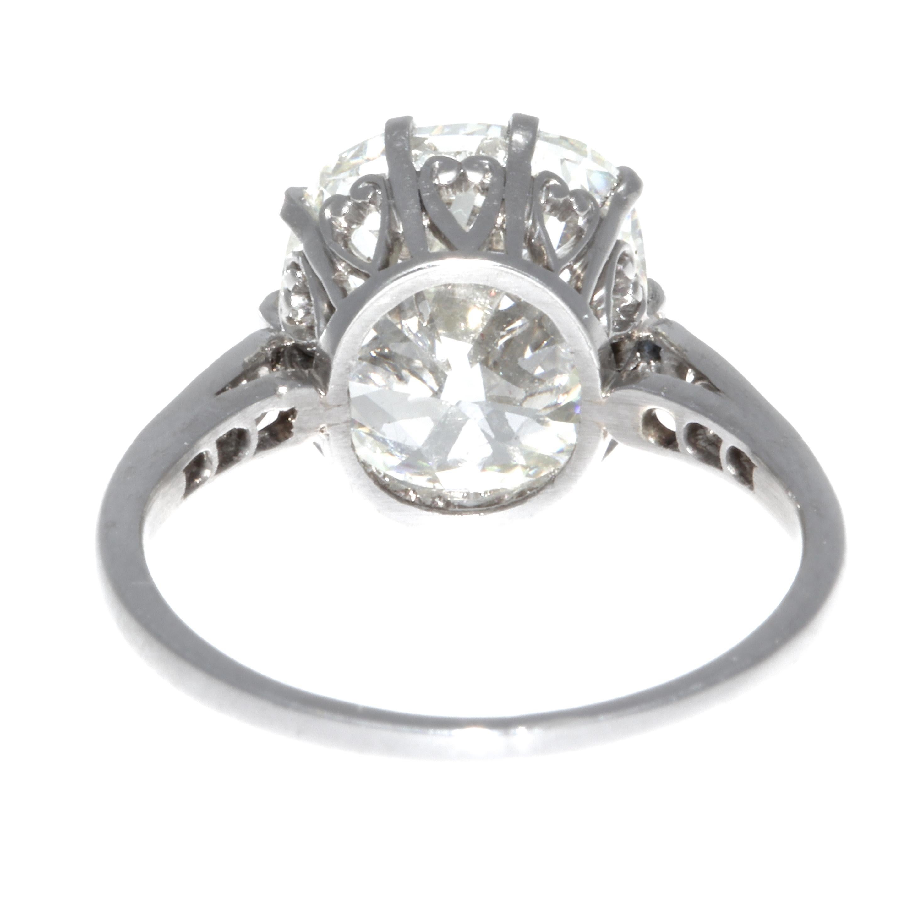 Women's Art Deco GIA 5.02 Carat Antique Cushion Cut Diamond Platinum Ring