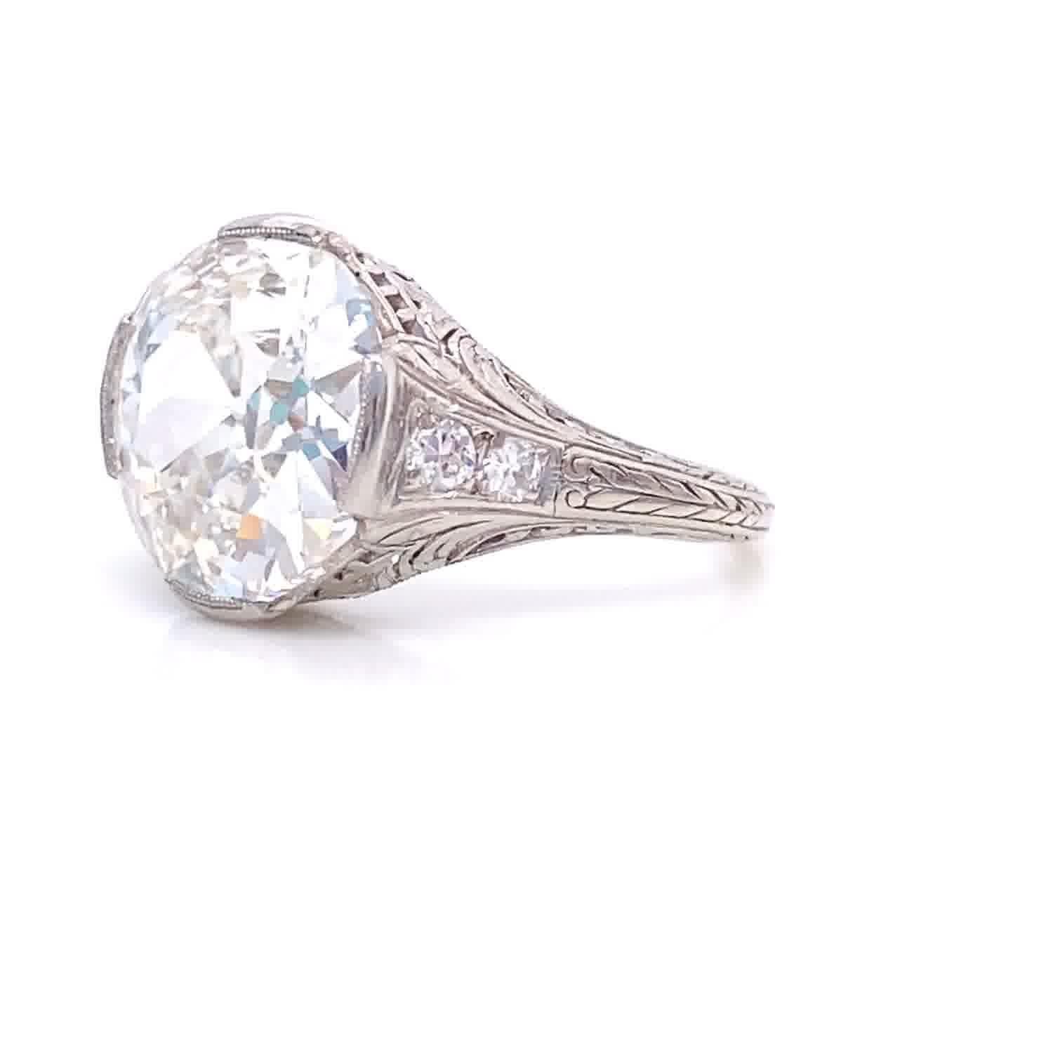 If you are looking for an 1920s diamond ring, featuring symmetry, fine detail, and a display of elegance you might consider this ring. This style was a trend in the 1920's and will still brighten your day when you see it on your finger. Diamond