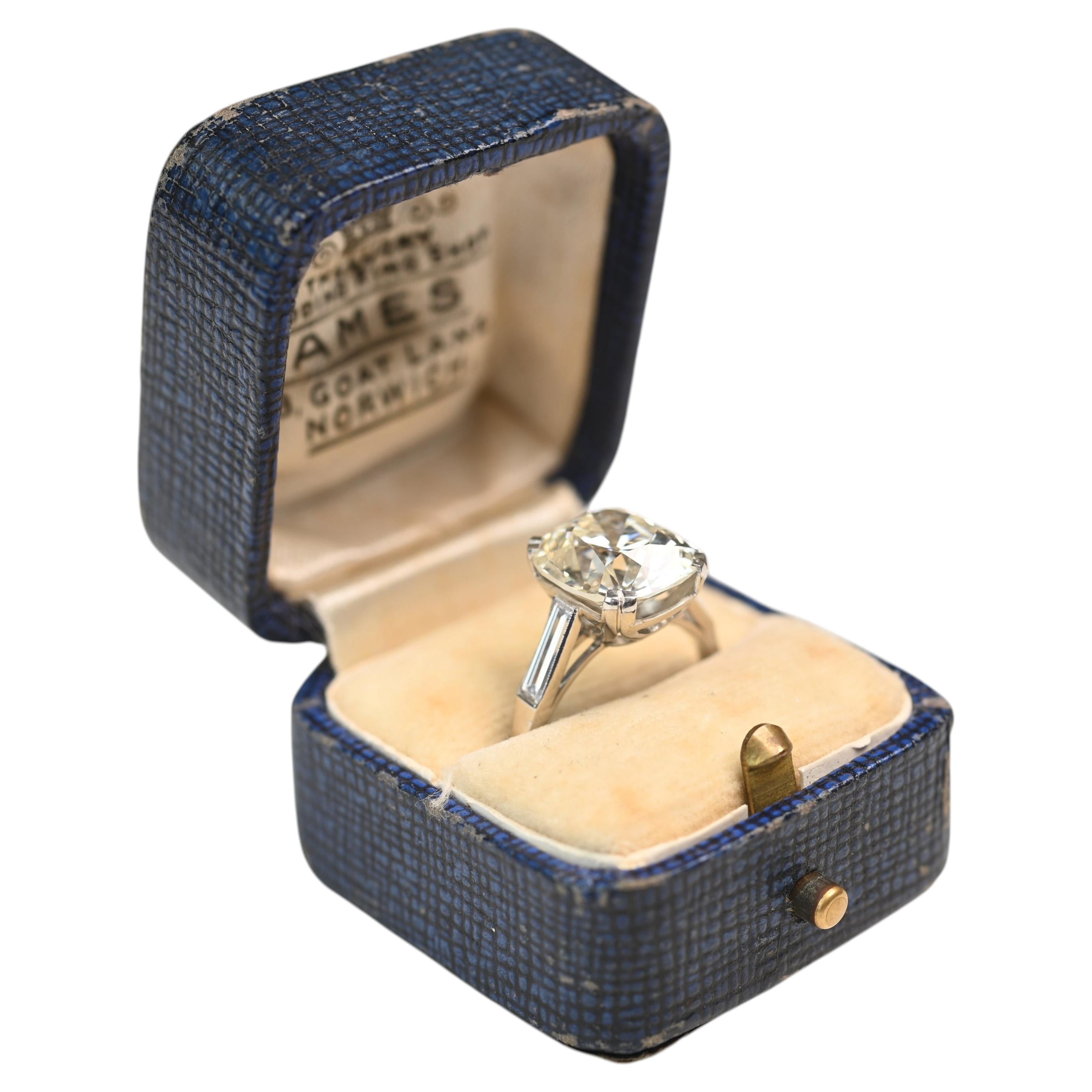 Art Deco GIA 5.50 Carat Antique Cushion Cut Ring. Diamond Accent Platinum K SI2