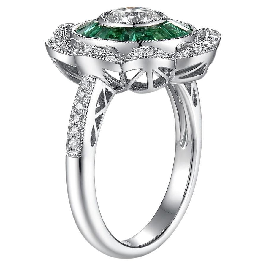 Presenting our Art Deco GIA Certified 0.70 Carat Diamond Emerald Platinum Engagement Ring, a masterpiece that embodies elegance and sophistication. This remarkable ring features a GIA certified 0.70 carat diamond, radiating exceptional brilliance