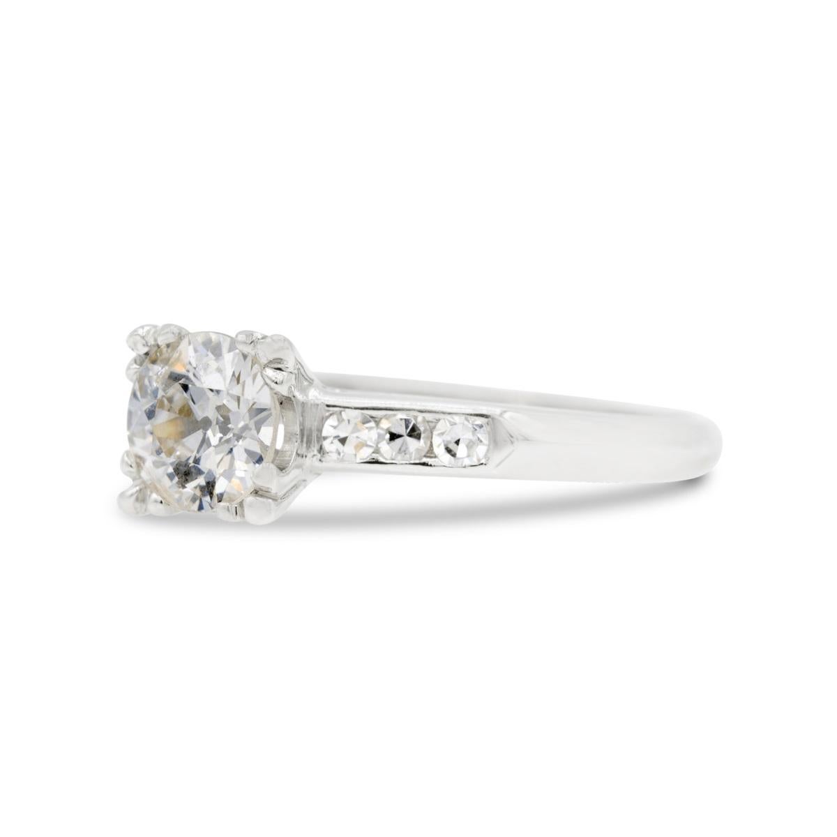 Platinum, knifes edge shank, fishtail art deco prongs. So classic. And we really love the 1.10 old European diamond at the center of this. A delightfully sparkling diamond with all the antique diamond traits we love; small table facet, prominent