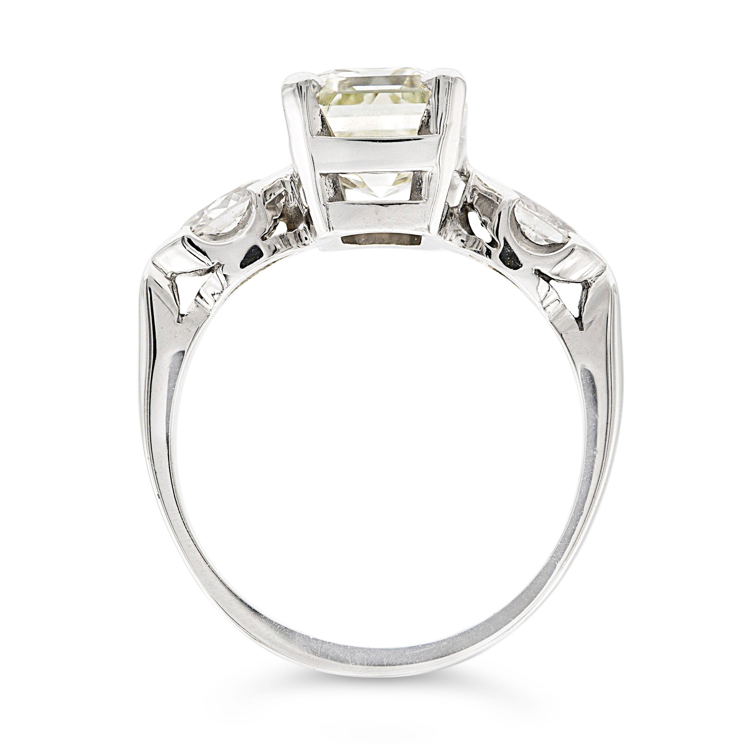 Art Deco GIA Certified 2.75 Ct. Emerald Cut Engagement Ring M VVS2 in Platinum In Good Condition For Sale In New York, NY