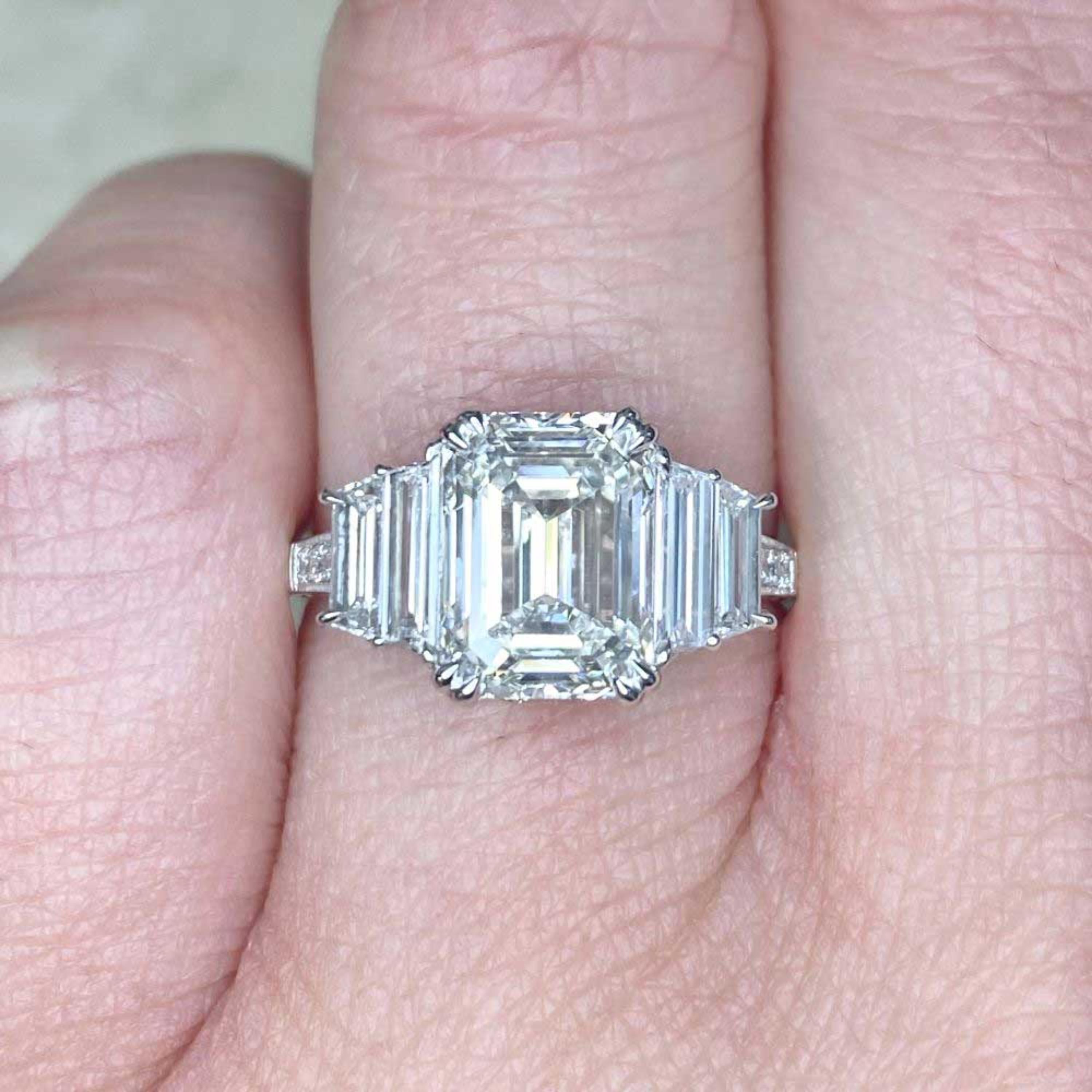 3.15 Carat H VS1 Emerald Cut Diamond Platinum Engagement Ring GIA Certified

A stunning ring featuring IGI/GIA Certified 2.12 Carat Emerald Cut Natural Diamond and 1.03 Carats of Diamond Accents set in Platinum.

A Diamond Is Forever - Diamonds have