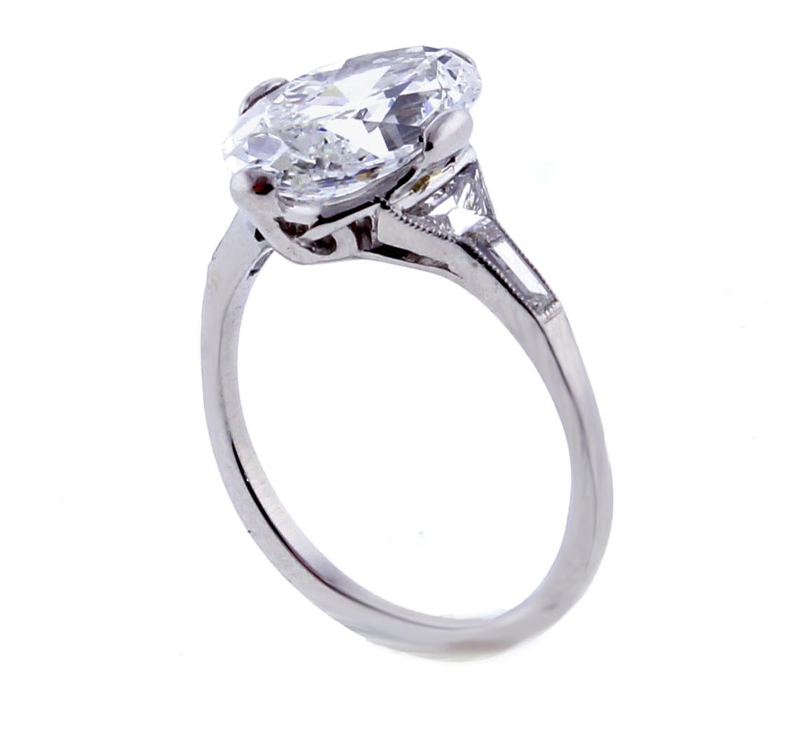 An exceptional oval diamond is set in a platinum Art Deco ring. The 3.56 carat oval diamond is F color and VS2 clarity.  Circa 1930.