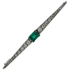 Art Deco GIA Certified Colombian Emerald and Diamond Brooch Pin