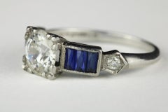 Art Deco GIA zertifizierter Diamant und blauer Saphir Verlobungsring