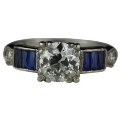 Art Deco GIA zertifizierter Diamant und blauer Saphir Verlobungsring