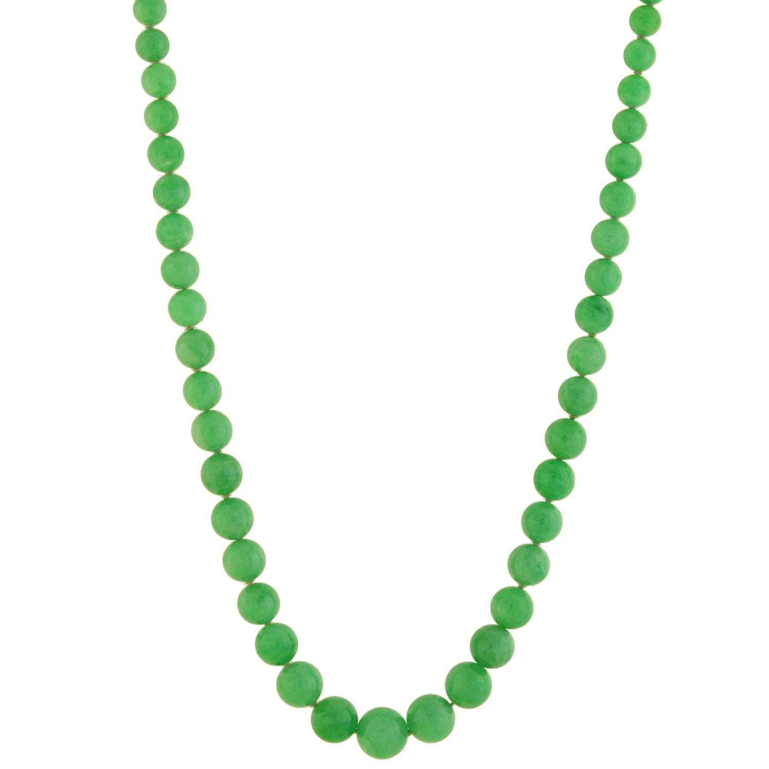 A stunning jadeite necklace from the Edwardian (ca1910) era! This high quality piece features a strand of 139 natural jadeite beads, which meet at a gorgeous platinum and diamond clasp. The jadeite has simply beautiful coloring, displaying a lovely