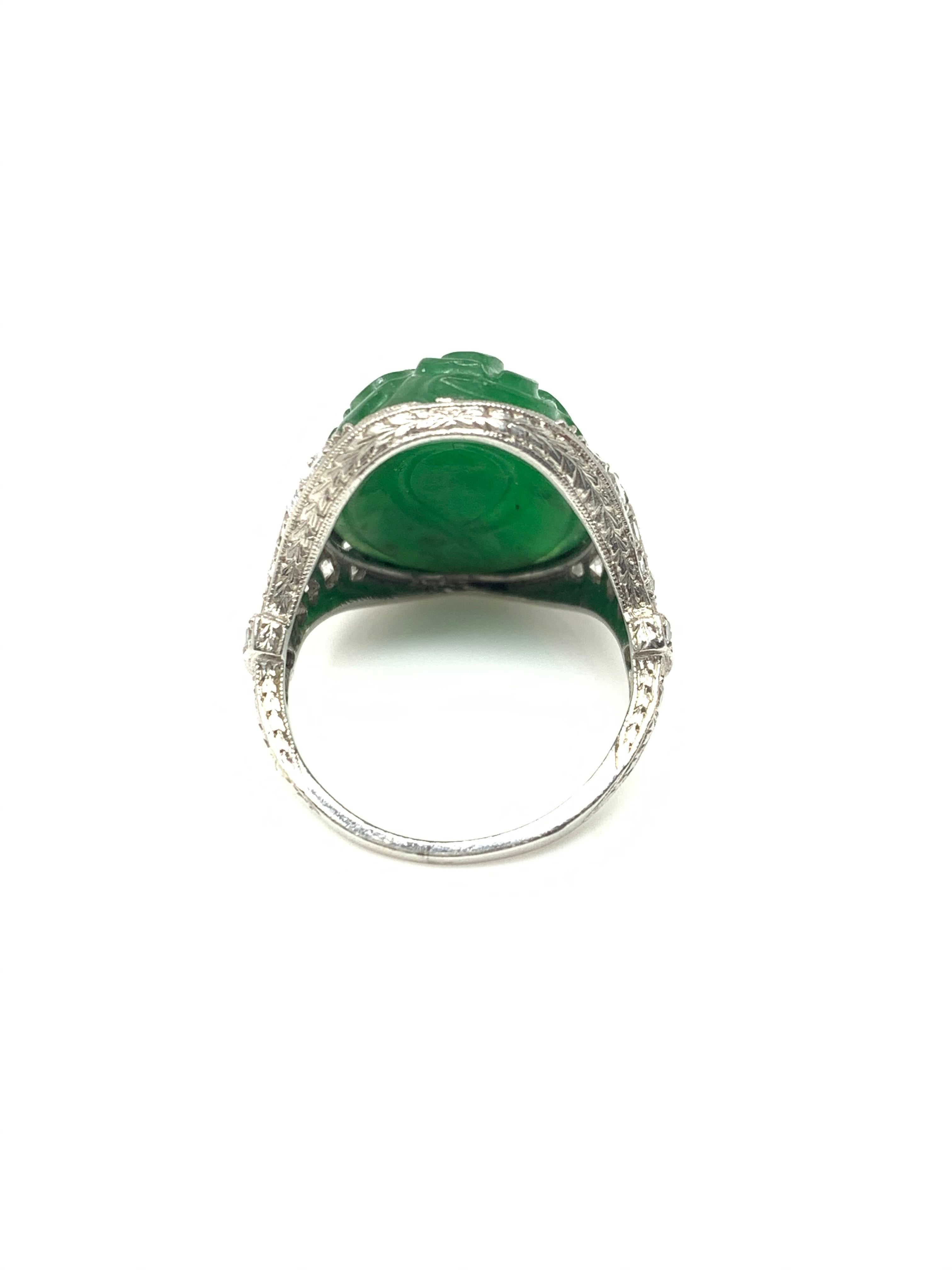 Women's or Men's Art Deco GIA Certified Oval Carved Jade and Diamond Ring in Platinum For Sale