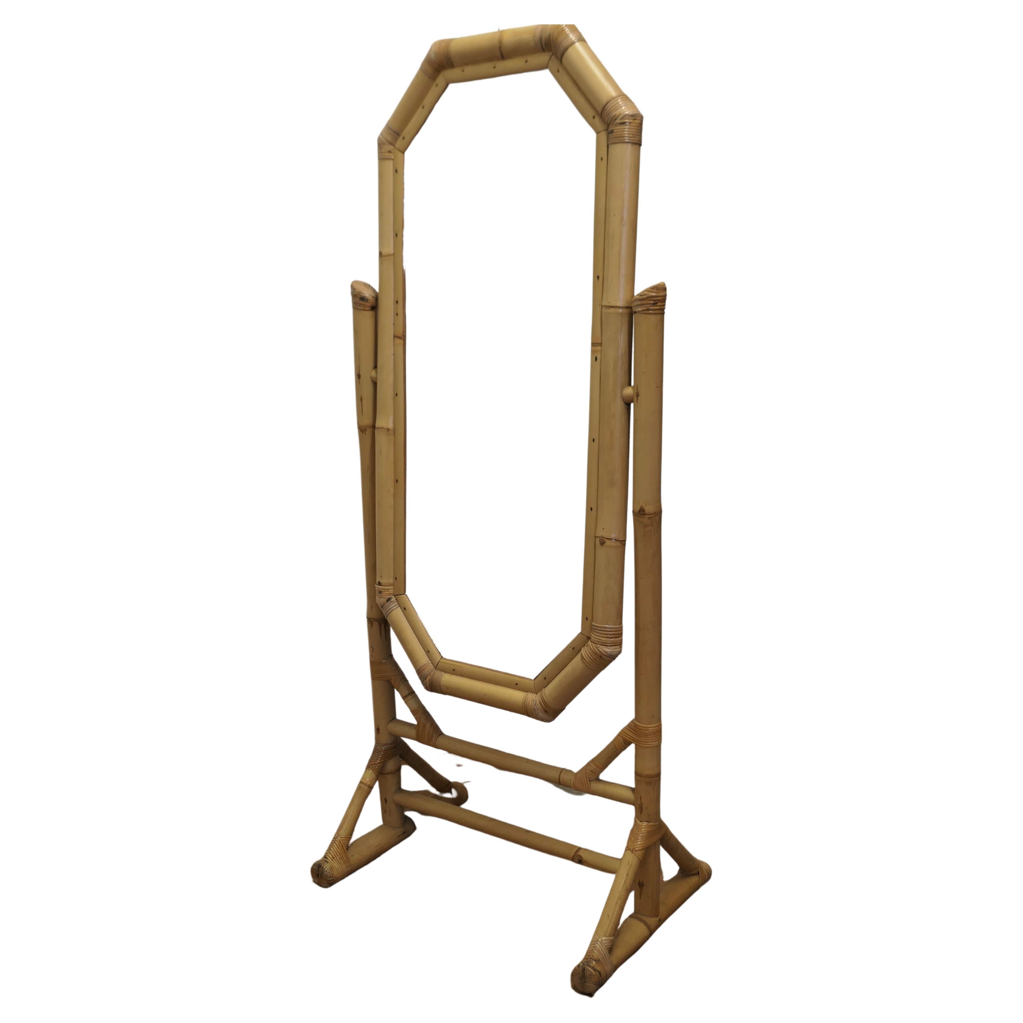 Art Deco Giant Bamboo Cheval Mirror
This is a very attractive piece, the tall mirror is framed with a wide bamboo frame, it mirror sits in a sturdy frame, the frame is also made in jumbo bamboo and the legs have a broad base for storage
The mirror