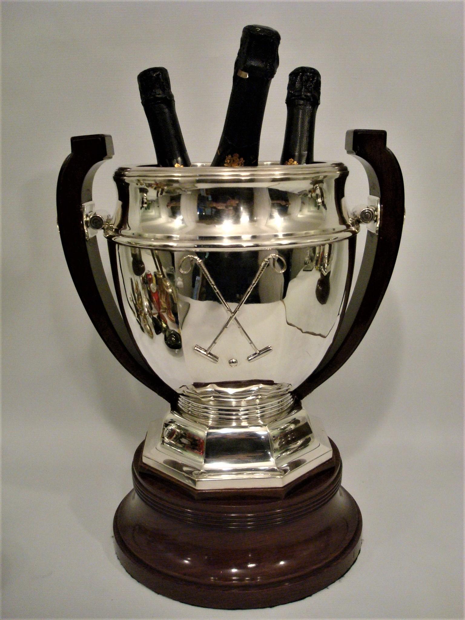 Art Deco Giant  Sterling Silver Polo Trophy - Cup - Champagne Cooler. Circa 1920. Fantastic Art Deco Polo Trophy. It can be used as a Wine or Champagne Cooler, you can fit upto 3 botles in it. On the front of the trophy you can see two crossed polo