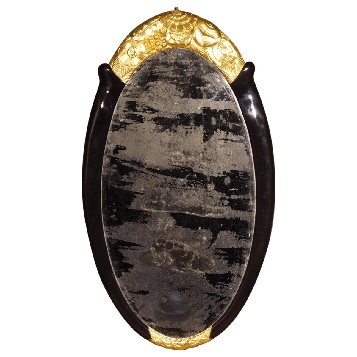 Art Deco Gilt and Black Lacquer Framed Oval Mirror Attributed to Süe et Mare For Sale
