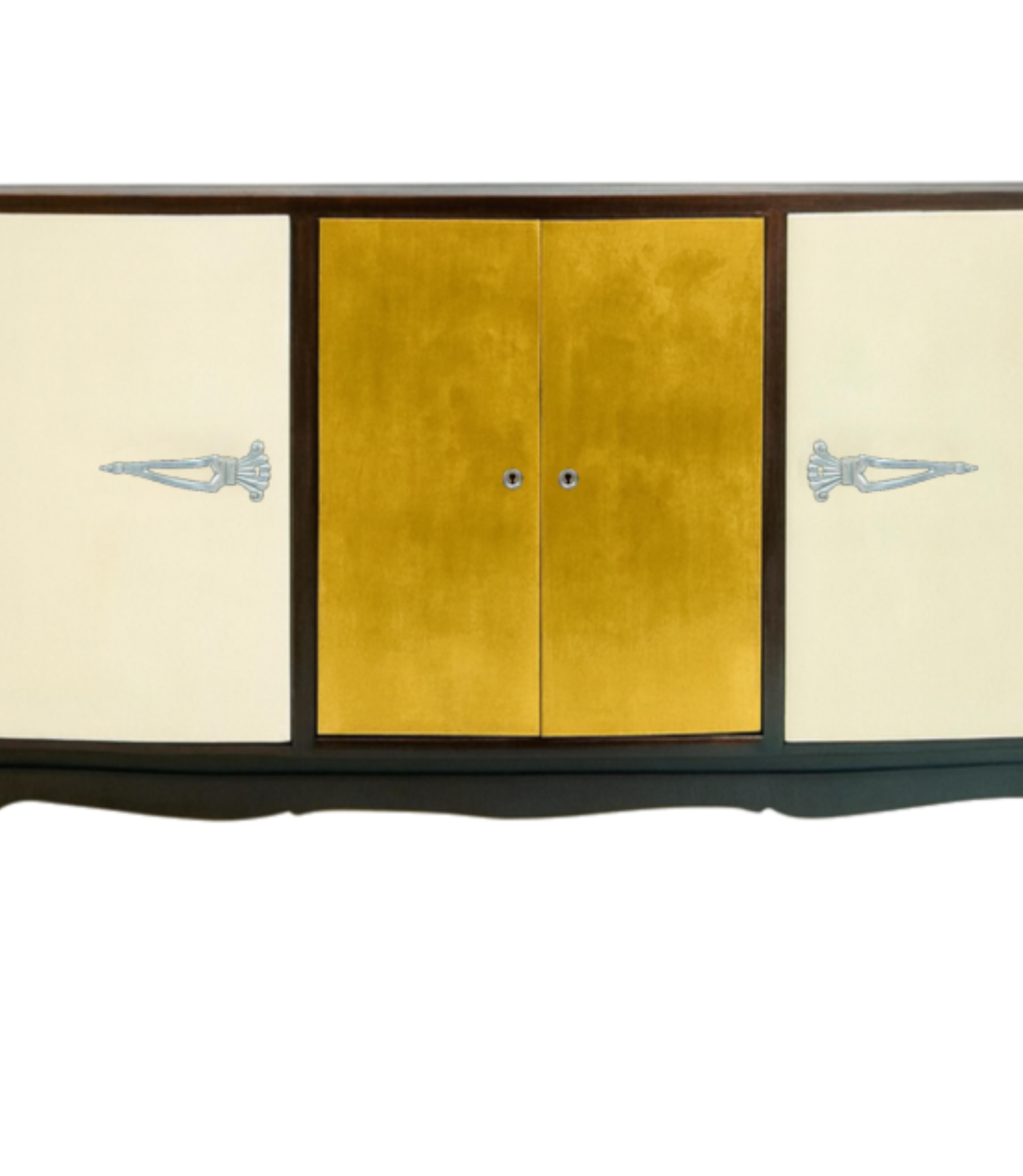 This stunning Art Deco gilted sideboard credenza, crafted in the 1930s, embodies the elegance and sophistication of the era. Blending American influence with French flair, the piece features chromed handles and hardware that gleam against its rich