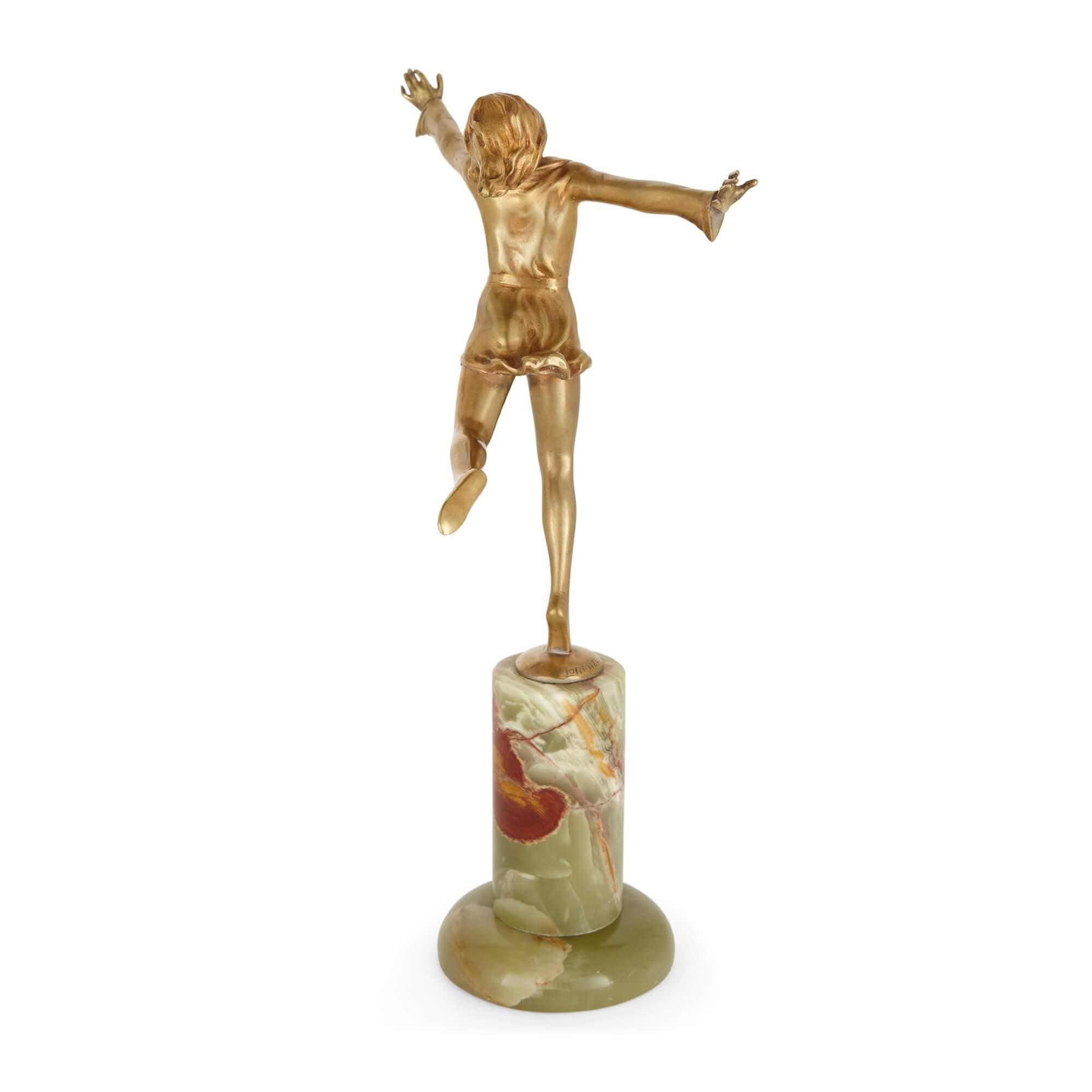 Austrian Art Deco gilt bronze and onyx figure of a dancer by Lorenzl For Sale