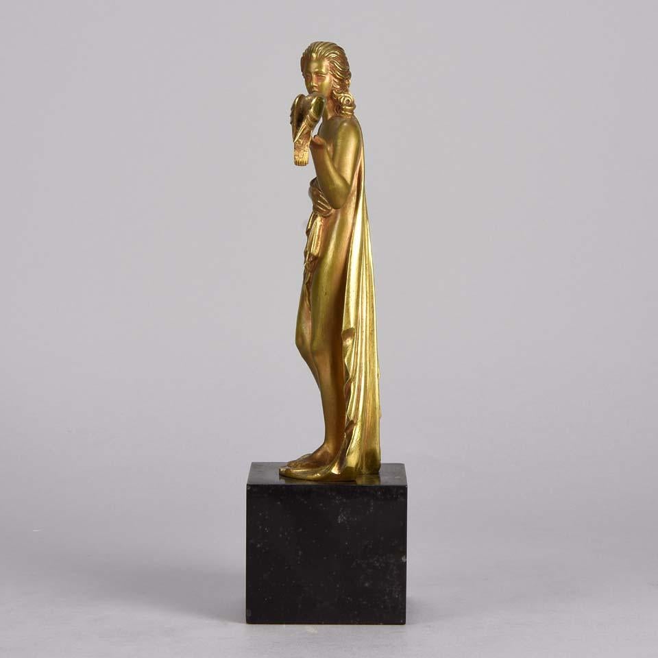 Cast Art Deco Gilt Bronze figure 'Femme avec Oiseau' by Pierre Laurel For Sale
