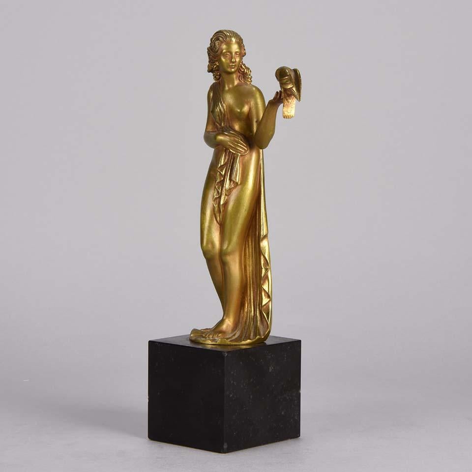 Art Deco Gilt Bronze figure 'Femme avec Oiseau' by Pierre Laurel In Good Condition For Sale In London, GB
