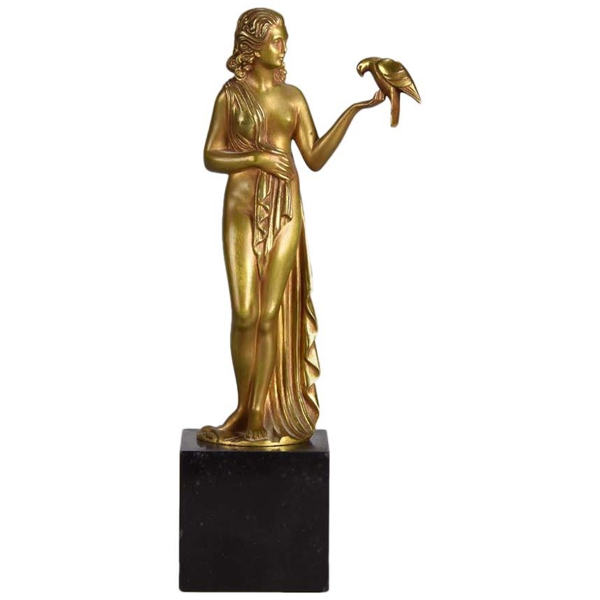 Figure en bronze doré Art déco, « Femme avec Oiseau » de Pierre Laurel