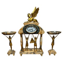 Art Deco vergoldete Bronze & Marmor Kaminsimsuhr w. Ägyptisches Revival mit Sphinx und Pharaonen