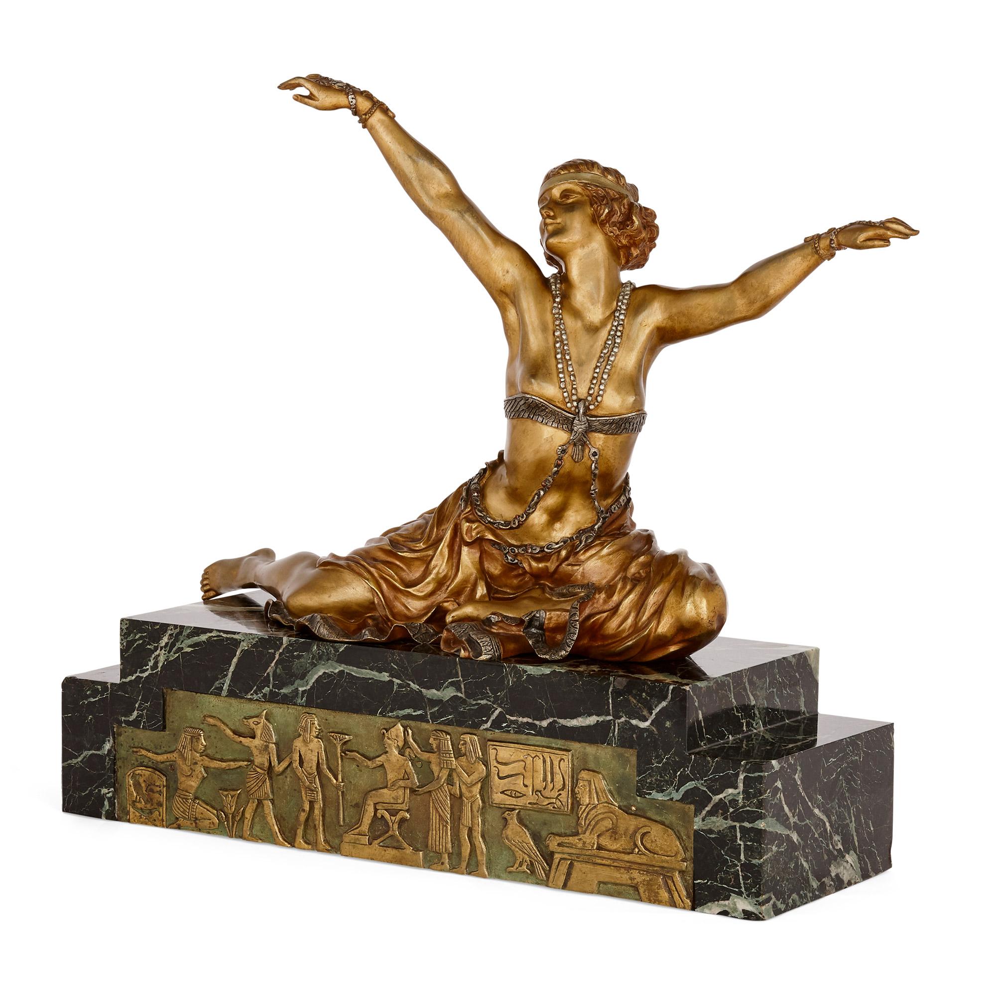 Art Deco gilt bronze sculpture of the 'Theban Dancer' by CJR Colinet
French, circa 1925
Measures: Height 55cm, width 59cm, depth 23cm

The important French female sculptor Claire Jeanne Roberte Colinet, beautifully made this Art Deco model using