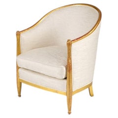 Fauteuil bergère Art déco en bois sculpté et doré, à dossier bombé, France, vers 1925