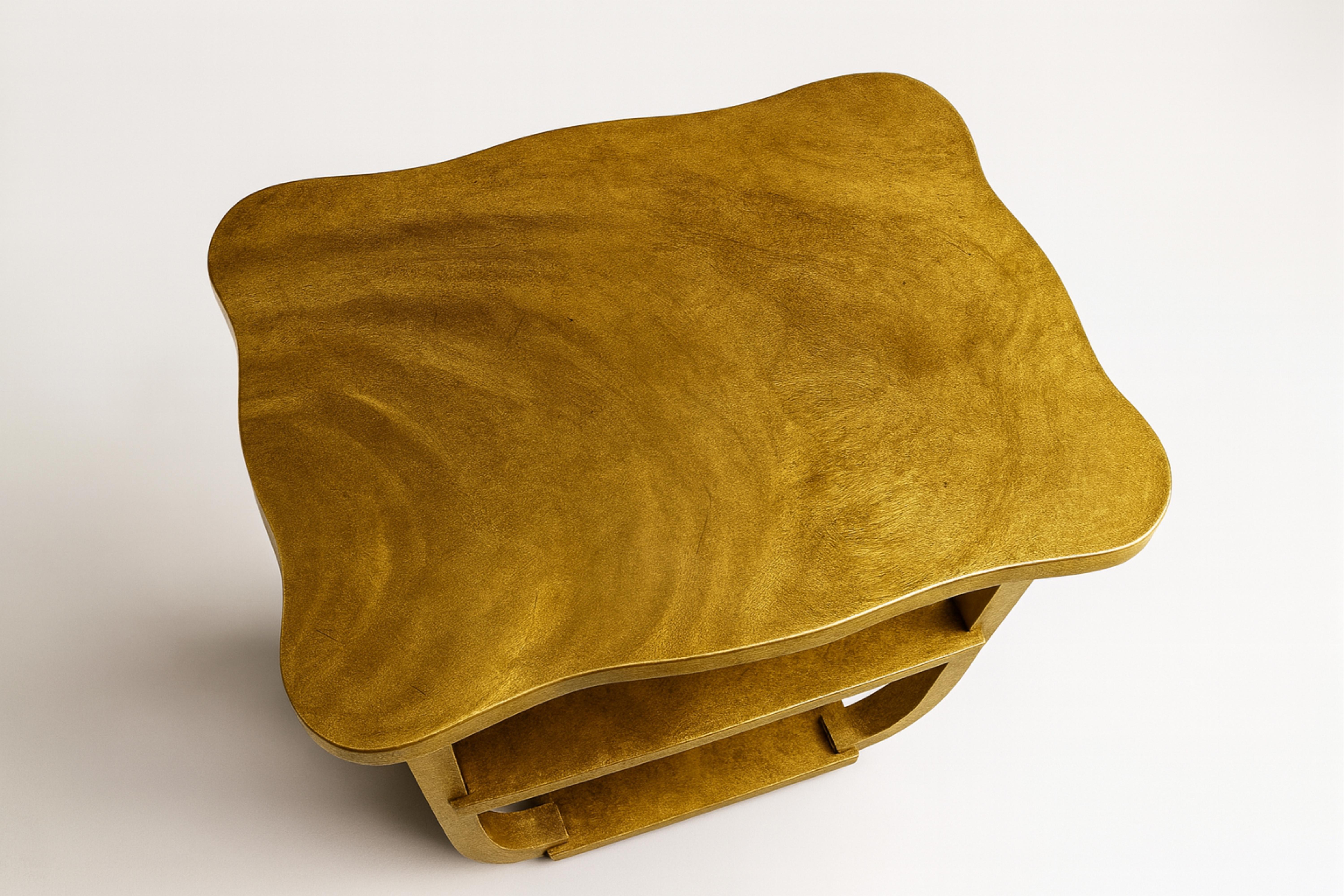 An Art Deco gilt small table from the 20th century
Geometric design with a single drawer for storage and a stylish curved base.

Perfect for bold maximalist interiors—pair it with a riot of vivid hues or let it elevate a sleek Art Deco scheme with