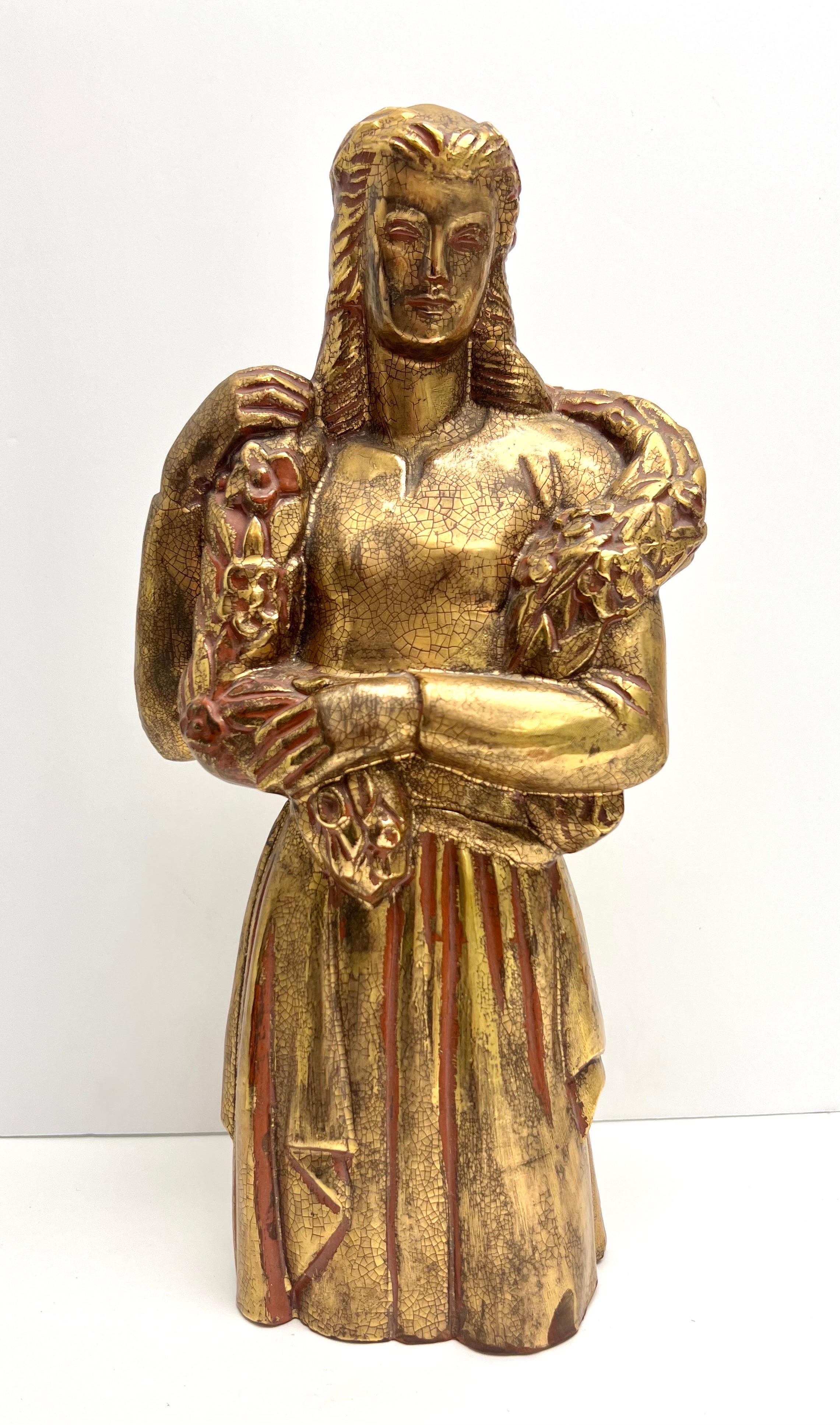 Beautiful terracotta sculpture with a gilt glaze.